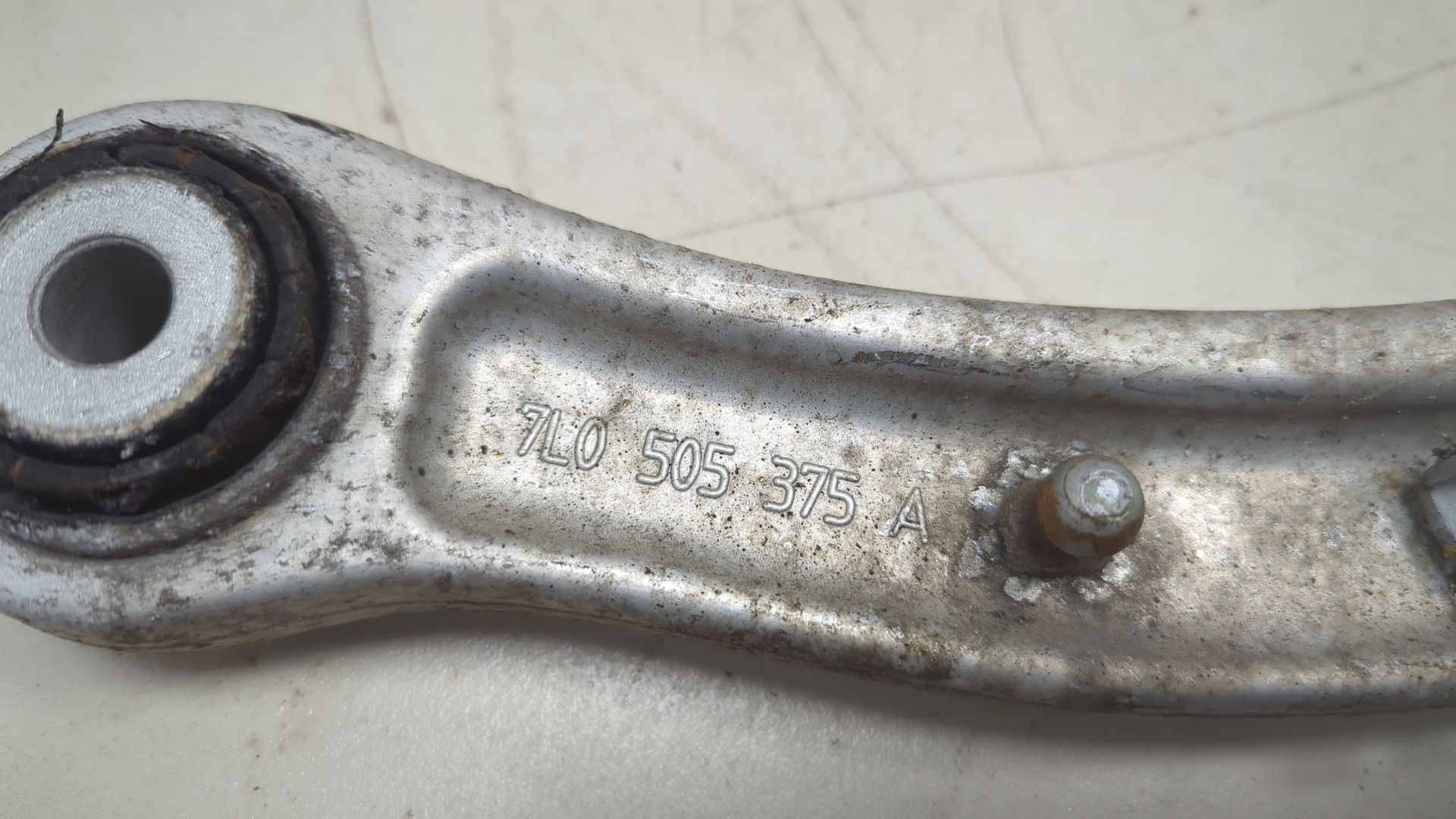 Рычаг задний левый