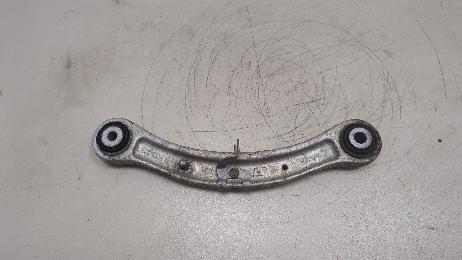 Рычаг задний левый