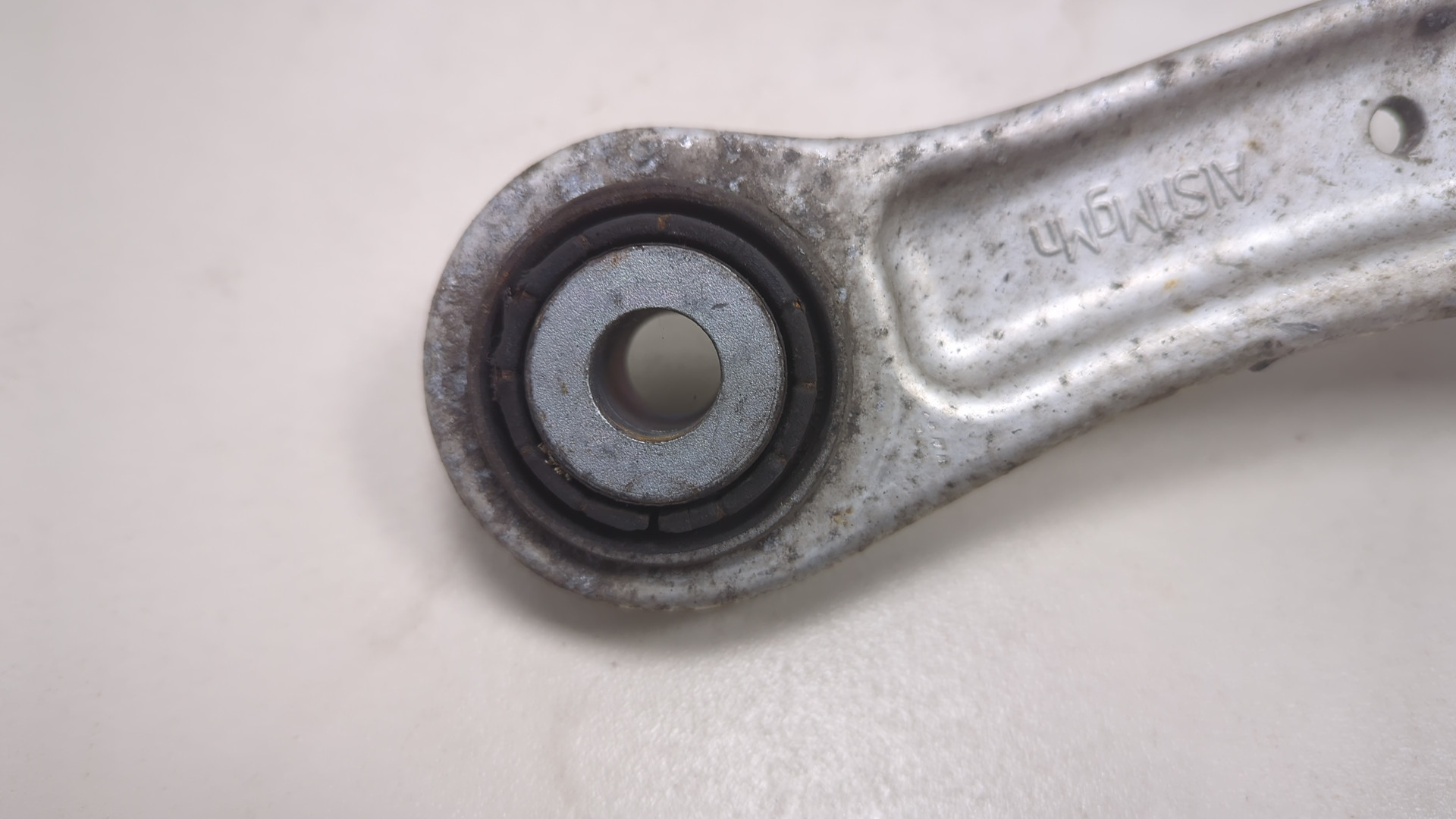 Рычаг задний левый