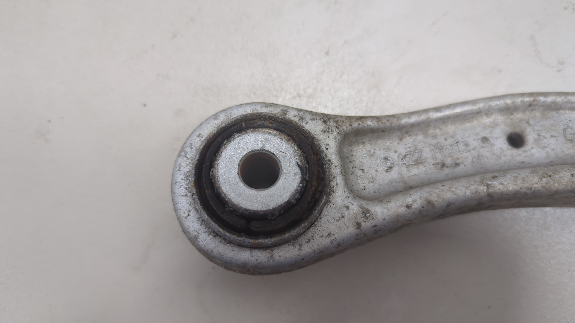 Рычаг задний левый