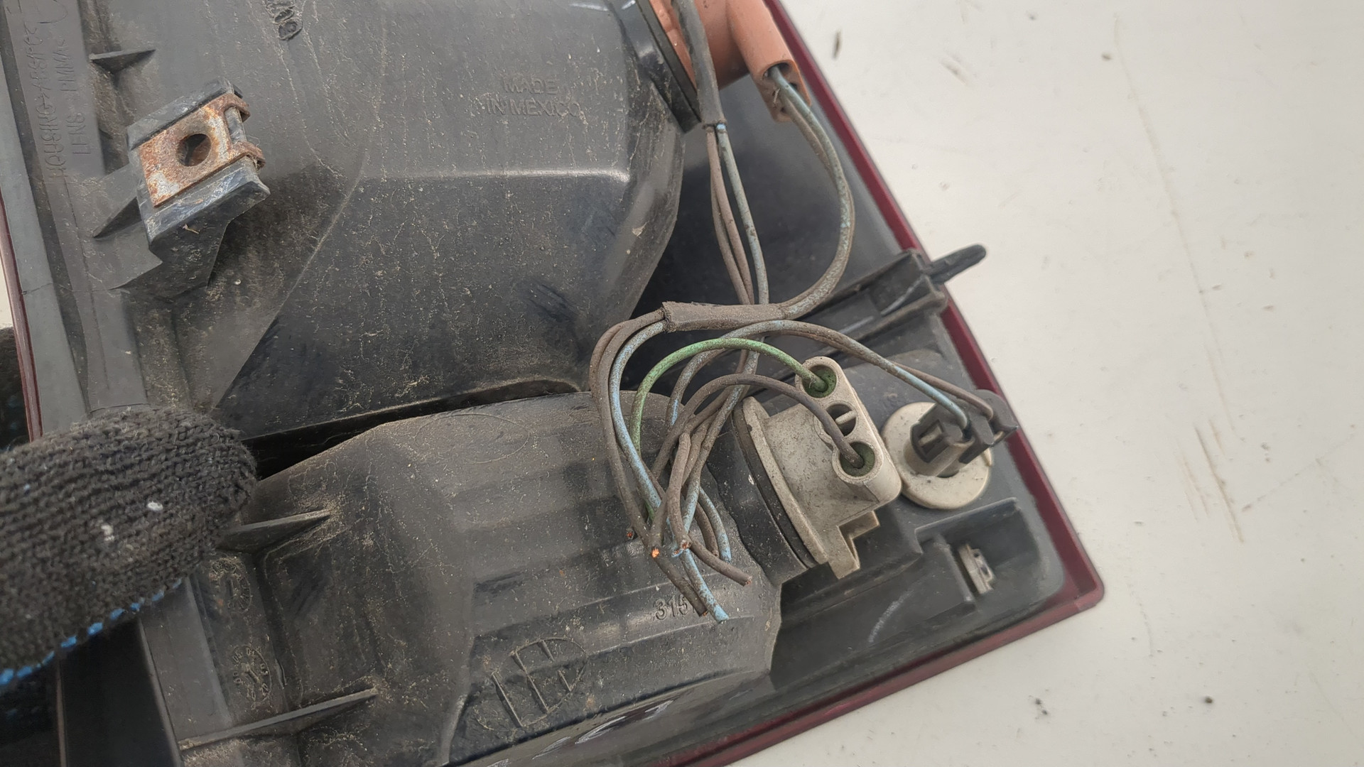 Фонарь задний левый