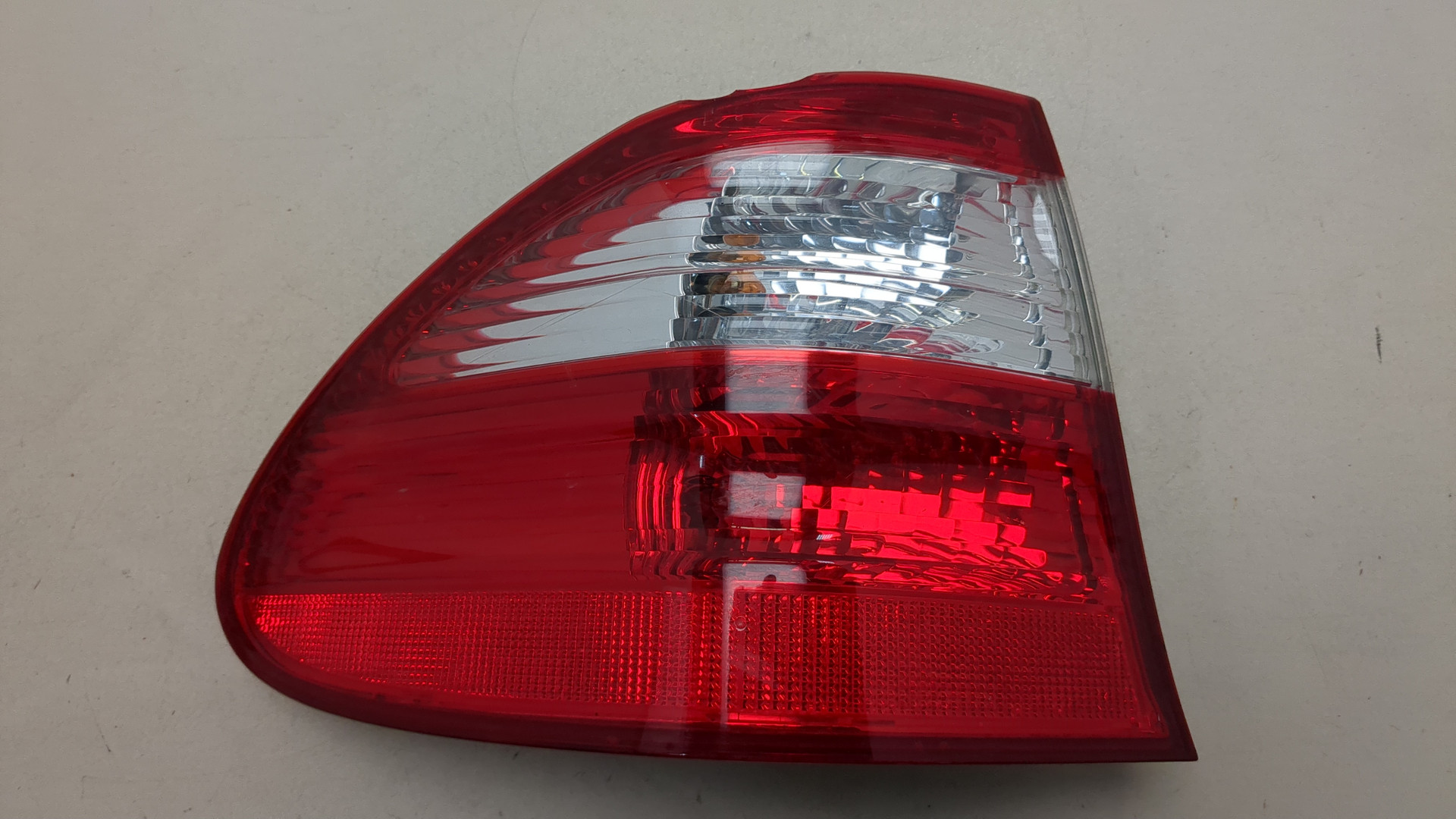 Фонарь задний левый