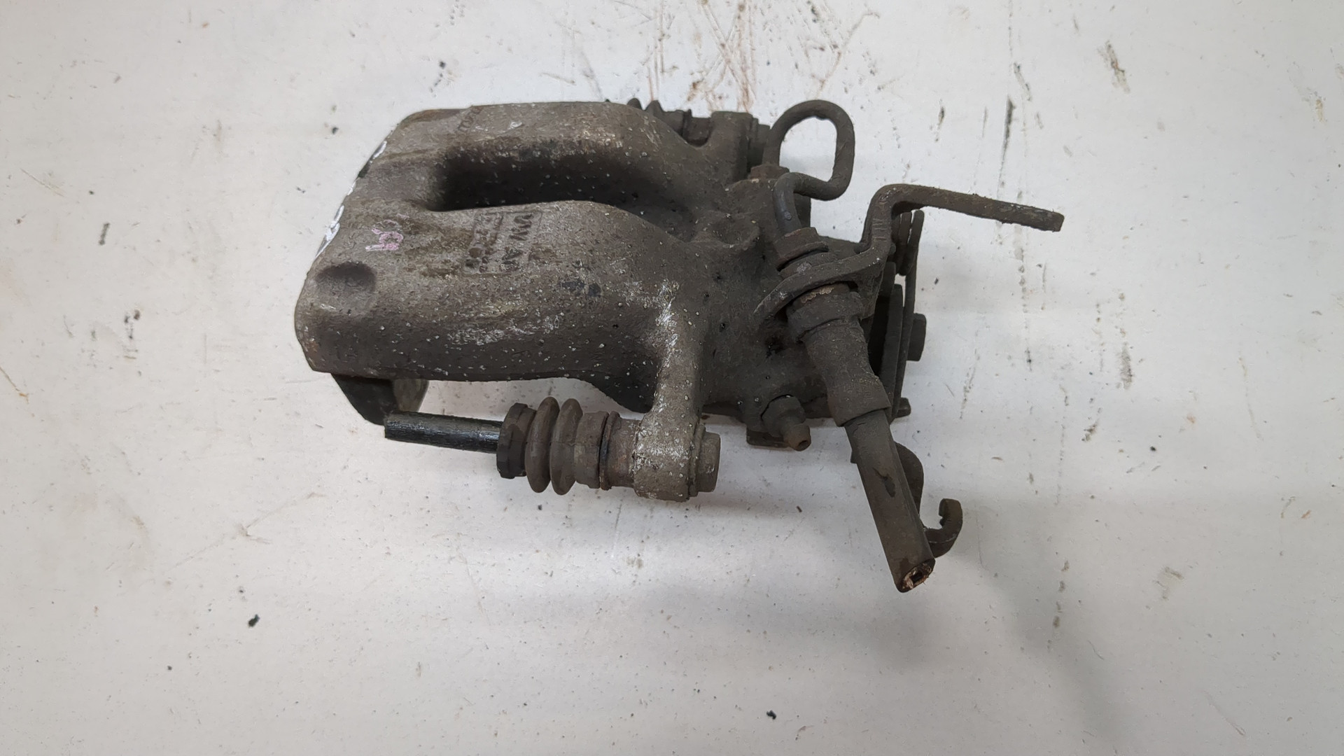 Суппорт задний левый