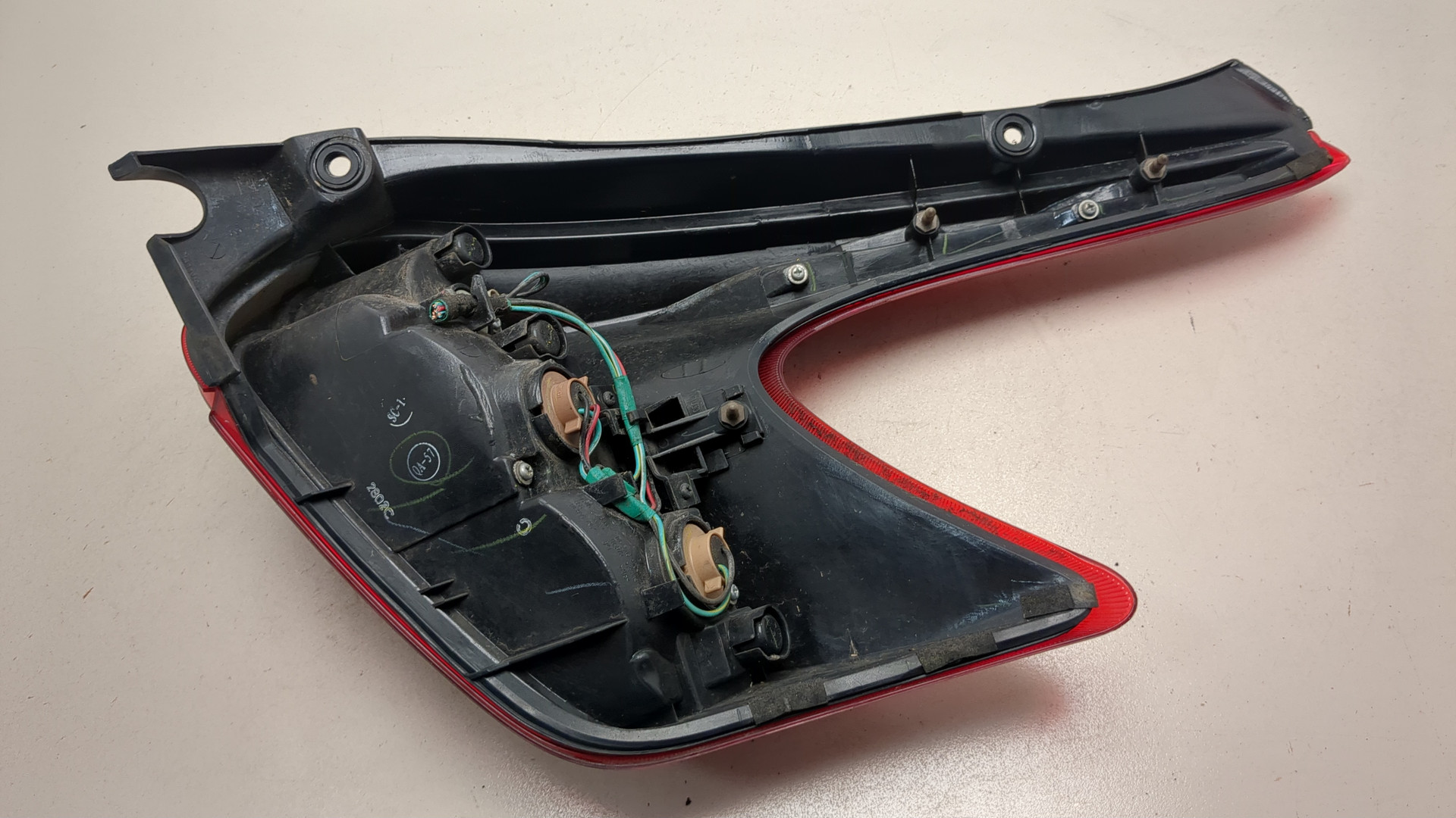 Фонарь задний левый