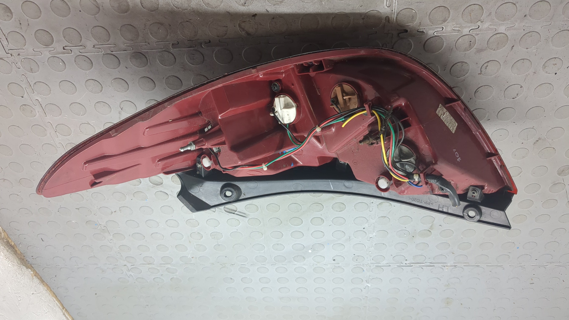 Фонарь задний левый