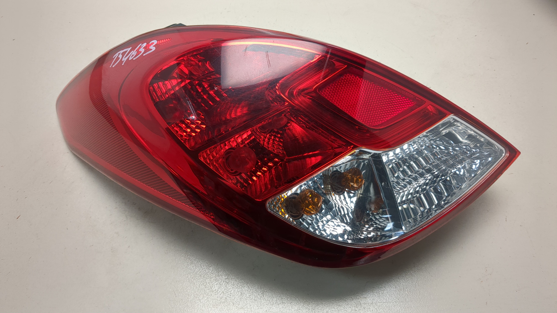 Фонарь задний левый