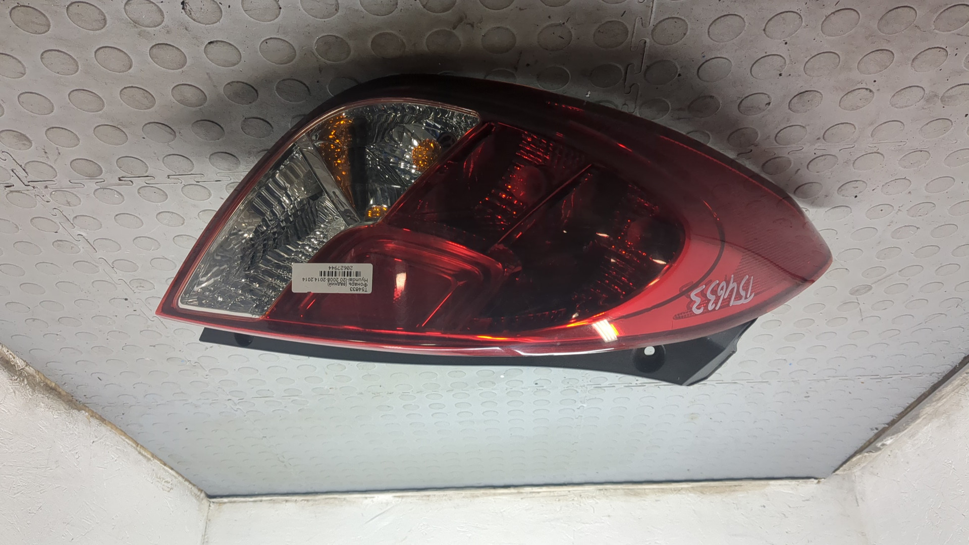 Фонарь задний левый