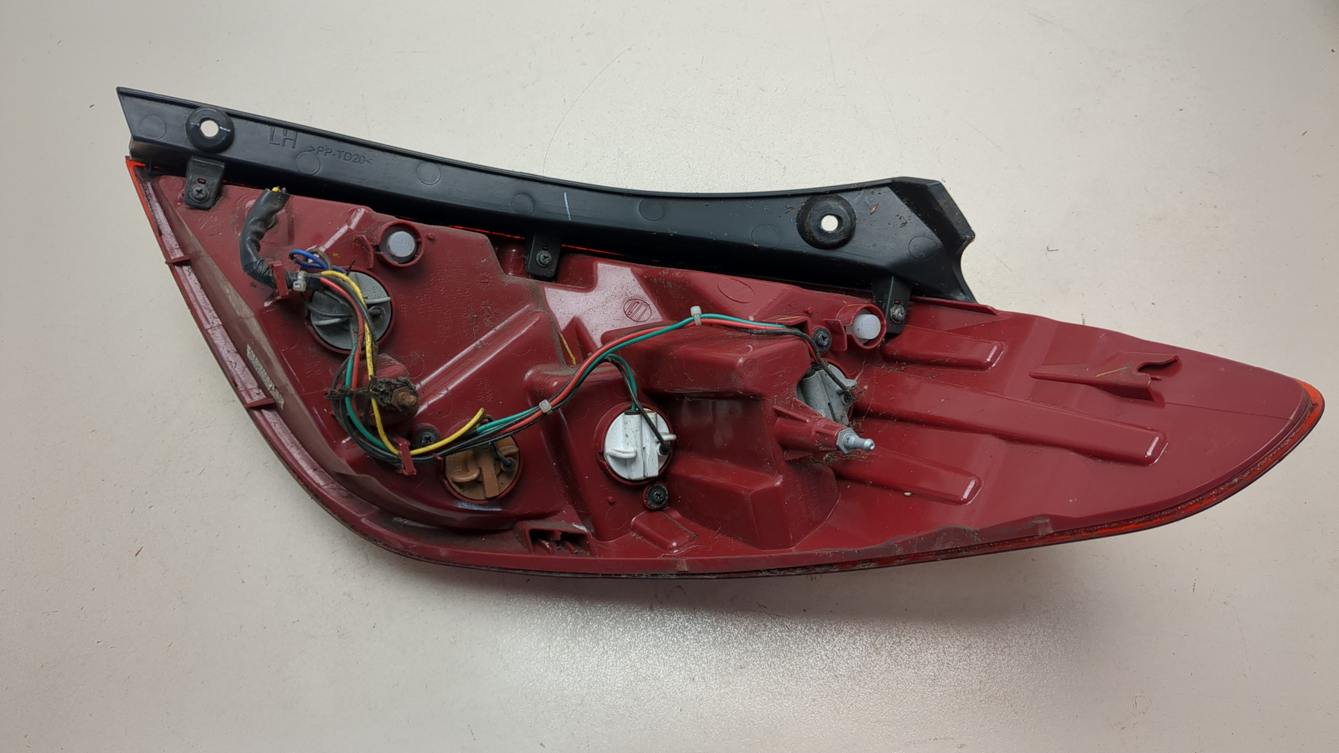 Фонарь задний левый