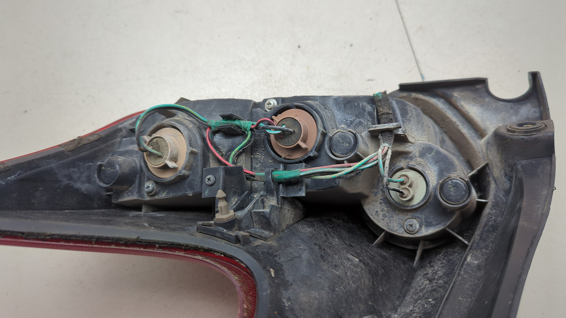 Фонарь задний левый