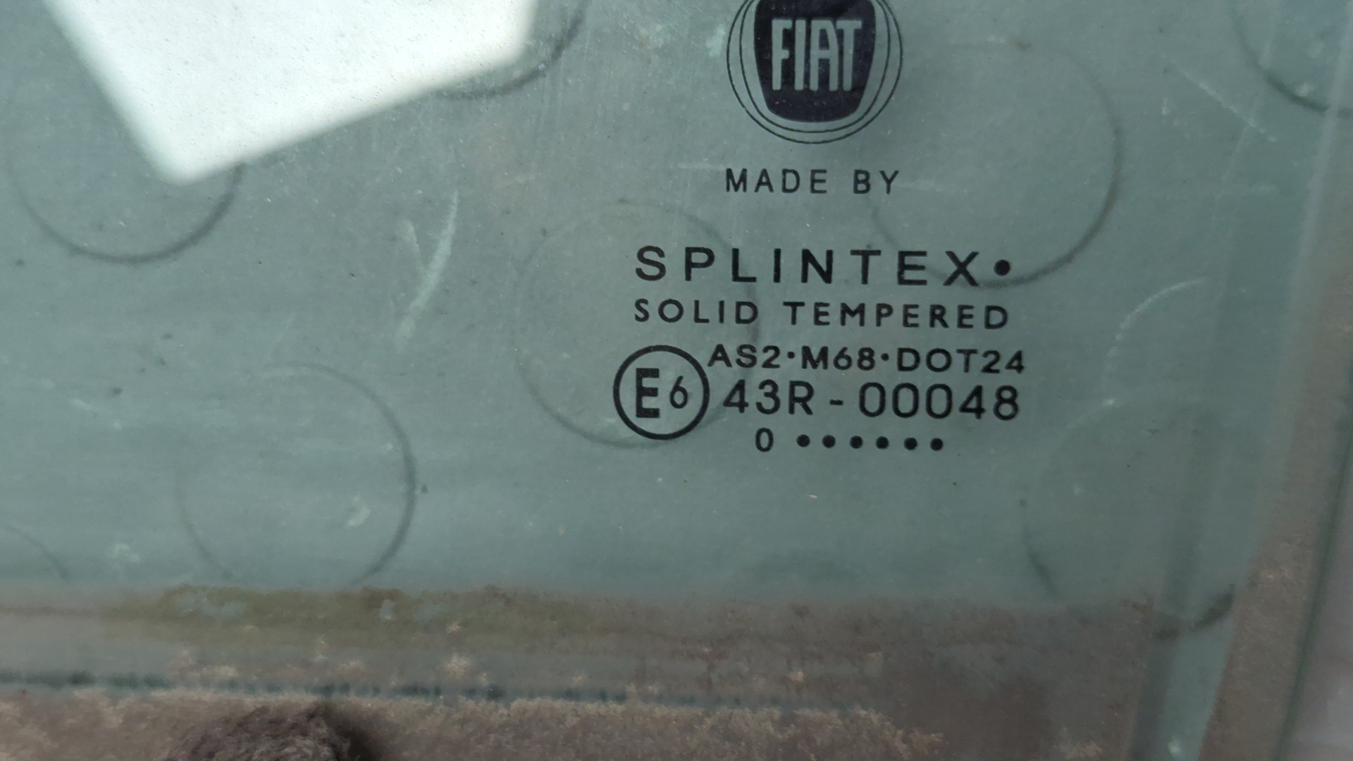 Стекло двери задней левой