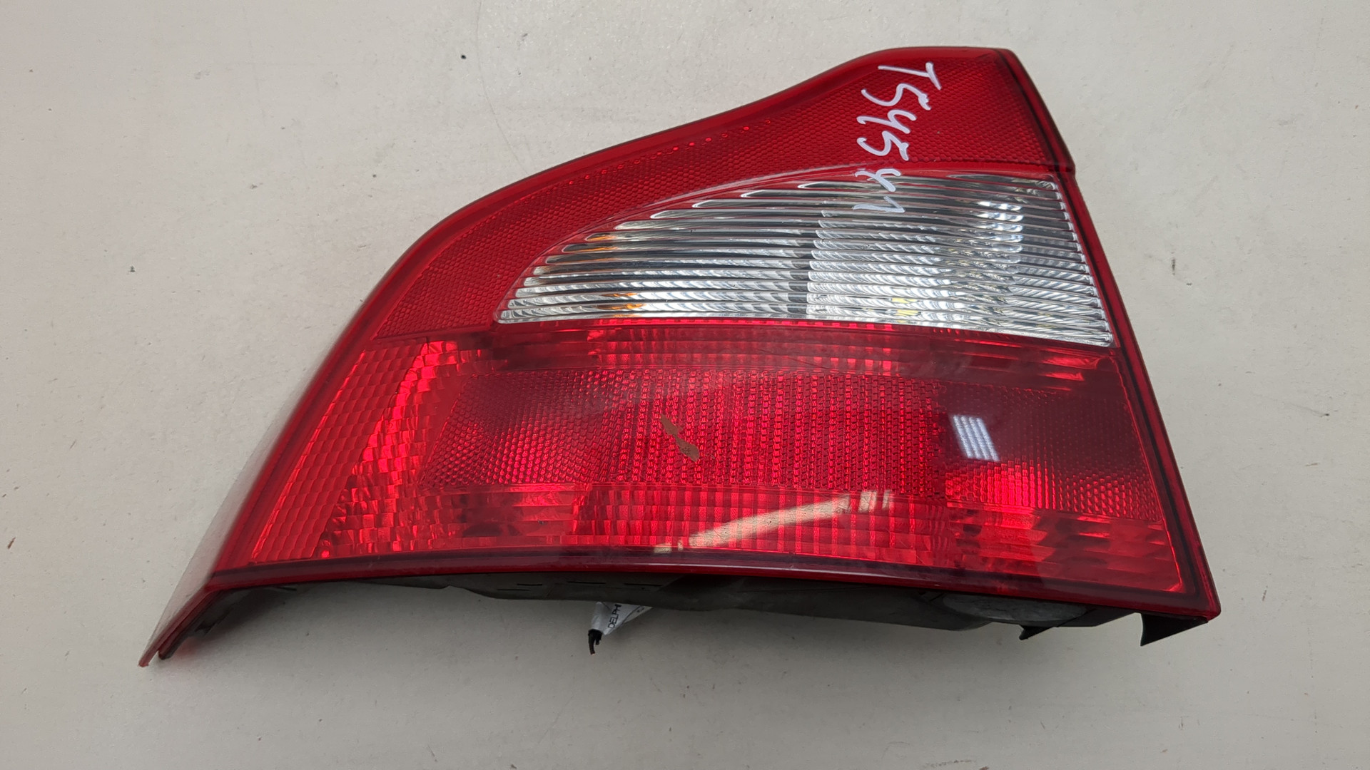 Фонарь задний левый