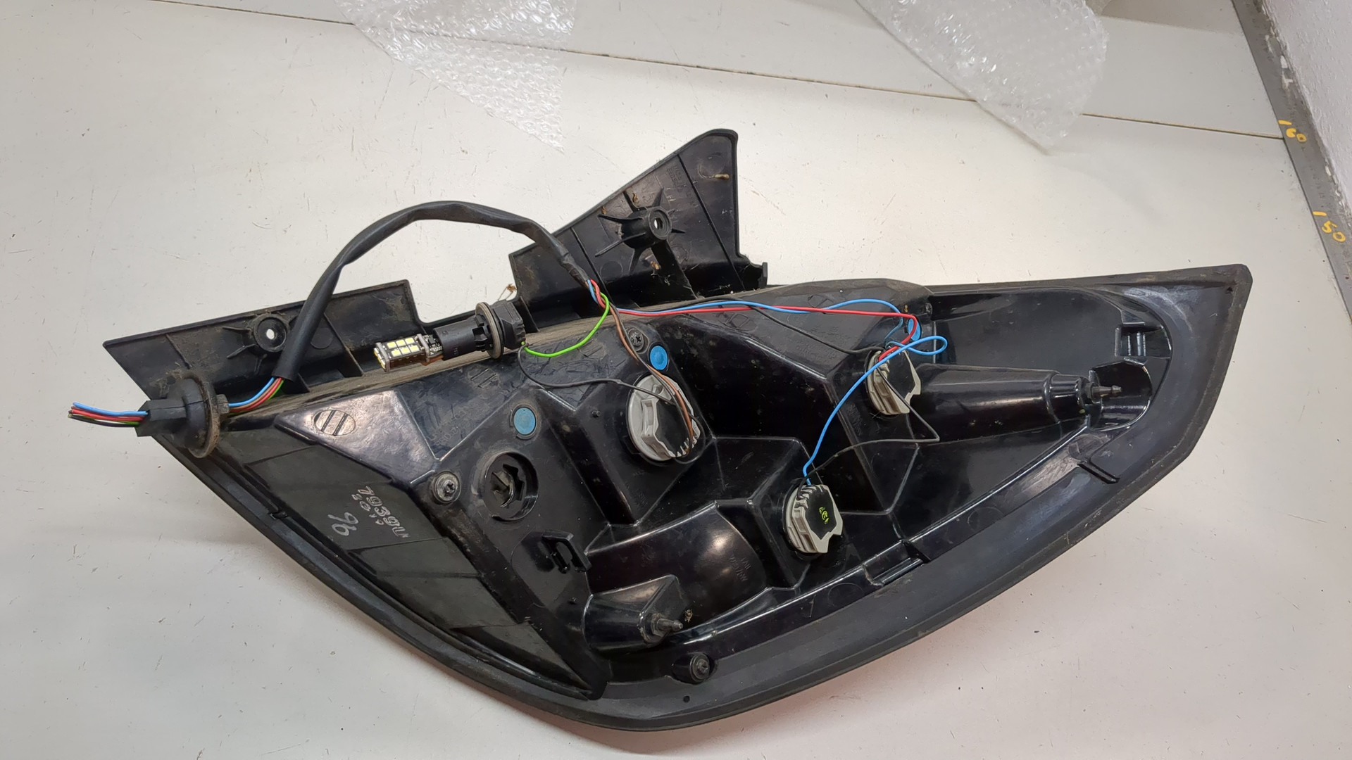 Фонарь задний левый