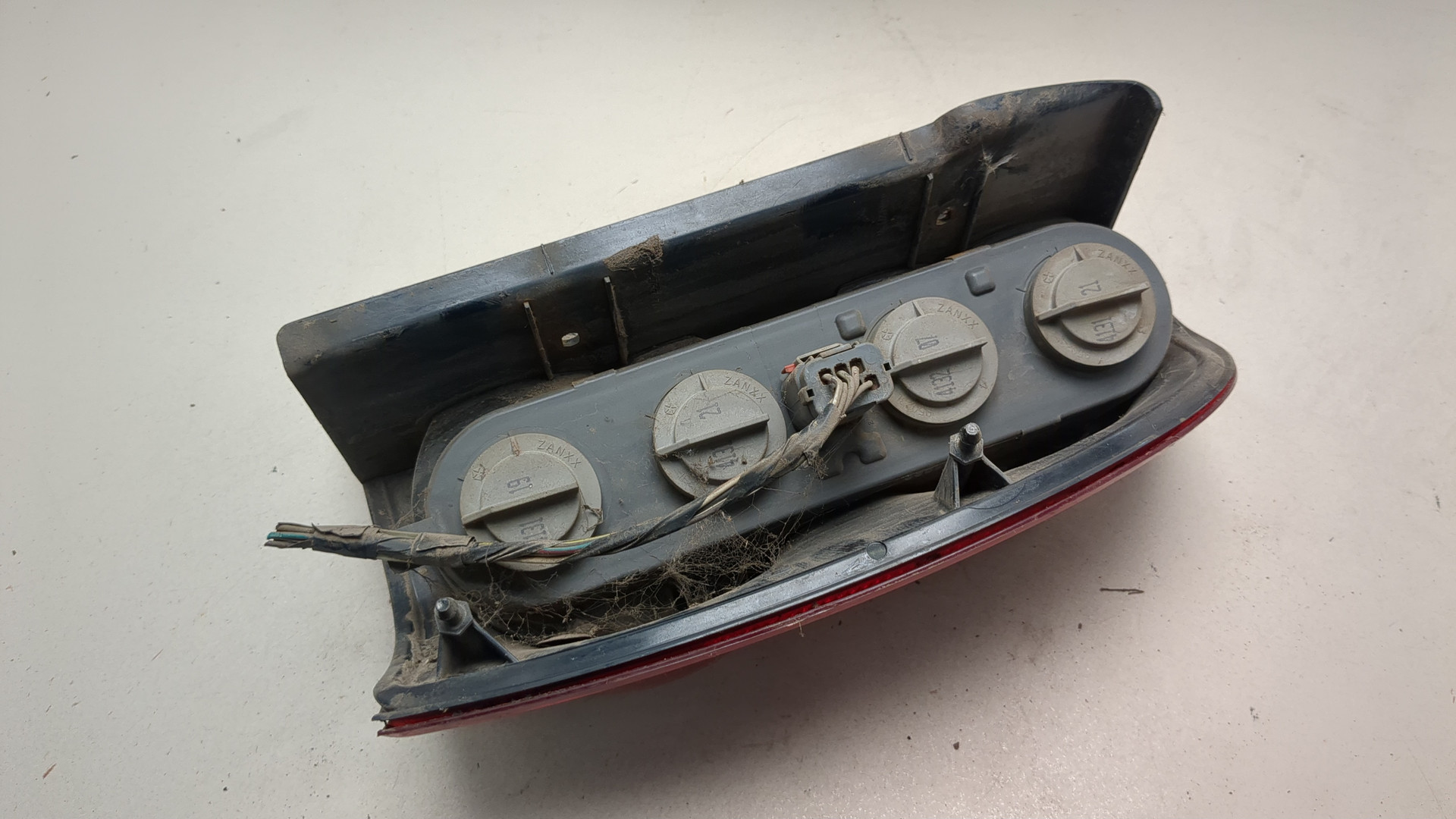 Фонарь задний левый