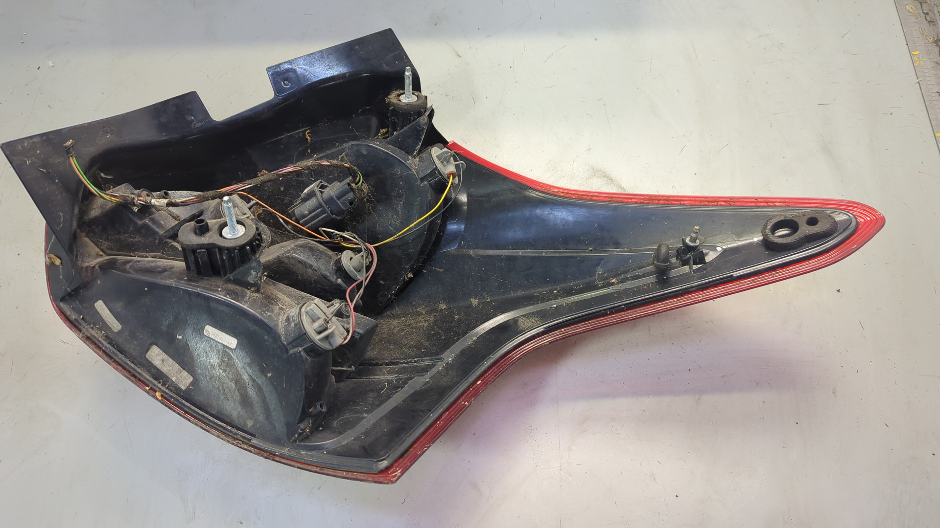 Фонарь задний левый