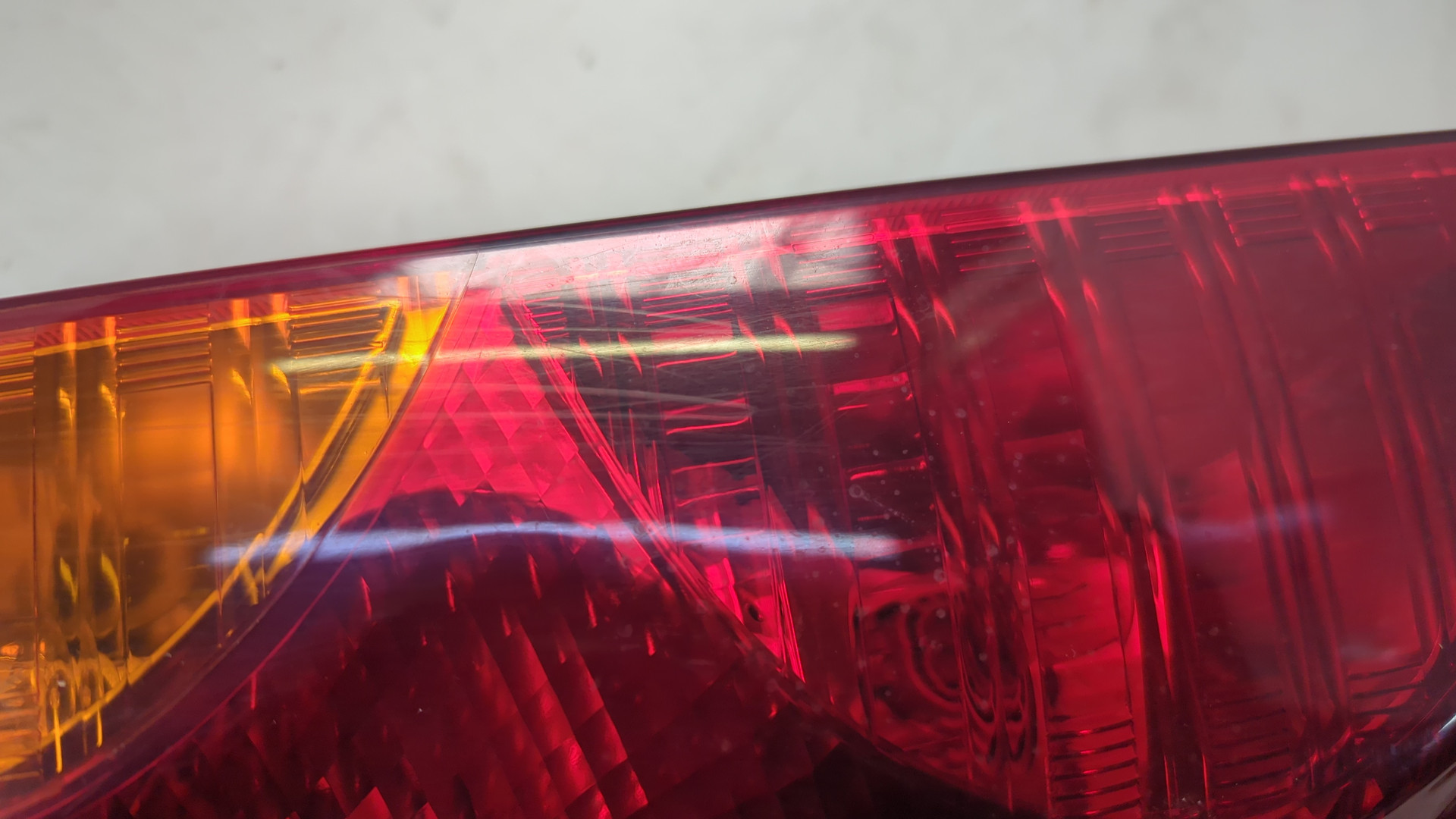 Фонарь задний левый