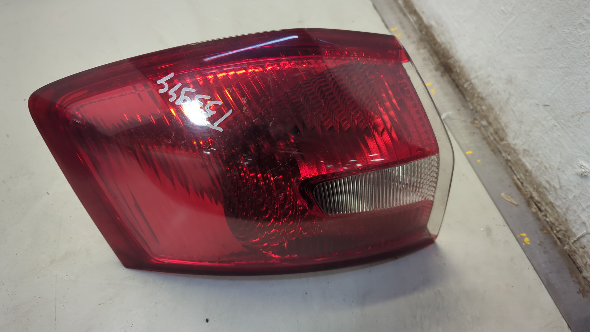 Фонарь задний левый