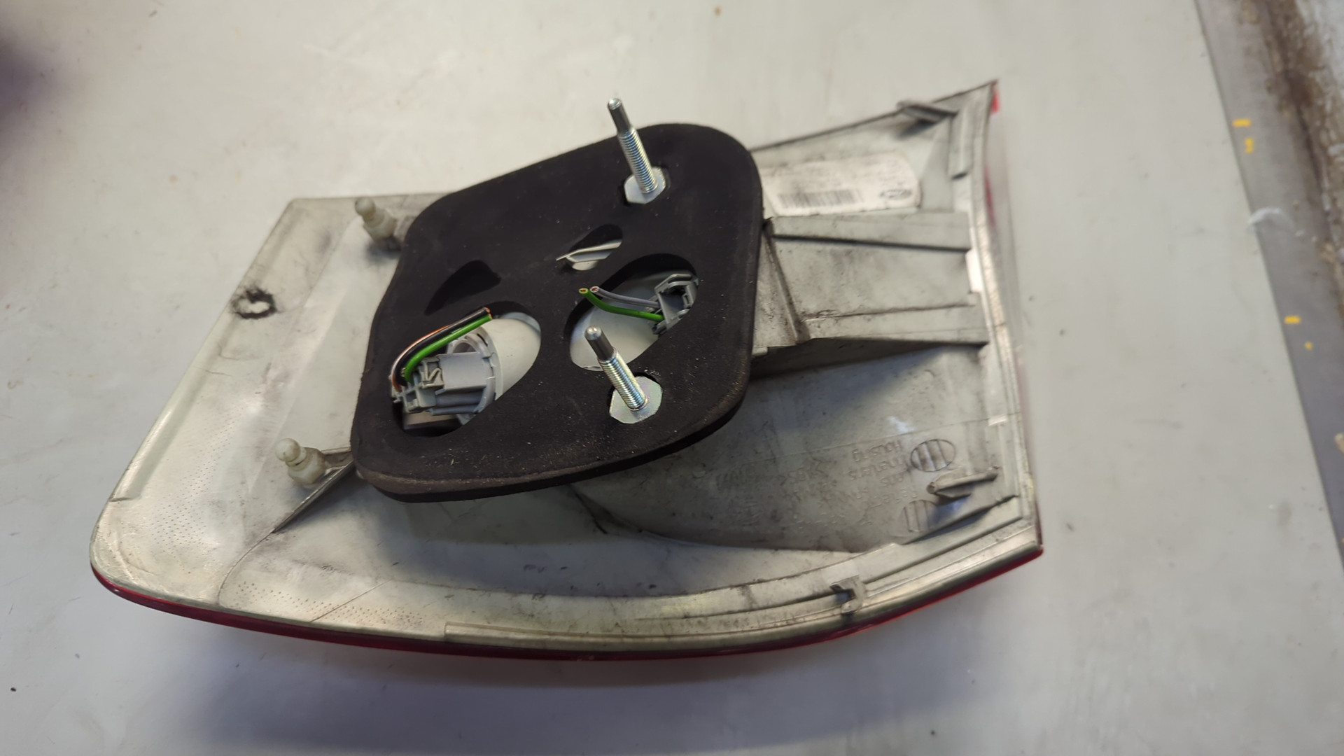 Фонарь задний левый