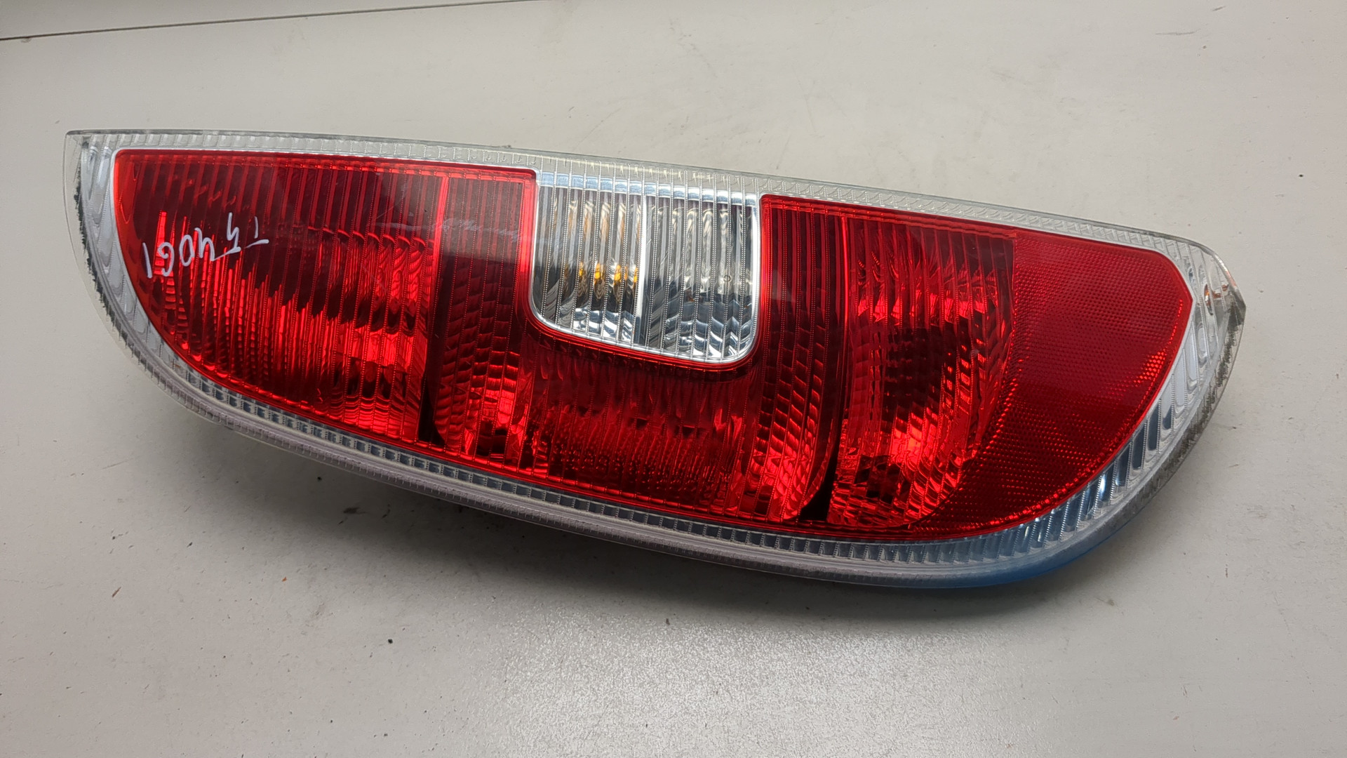 Фонарь задний левый