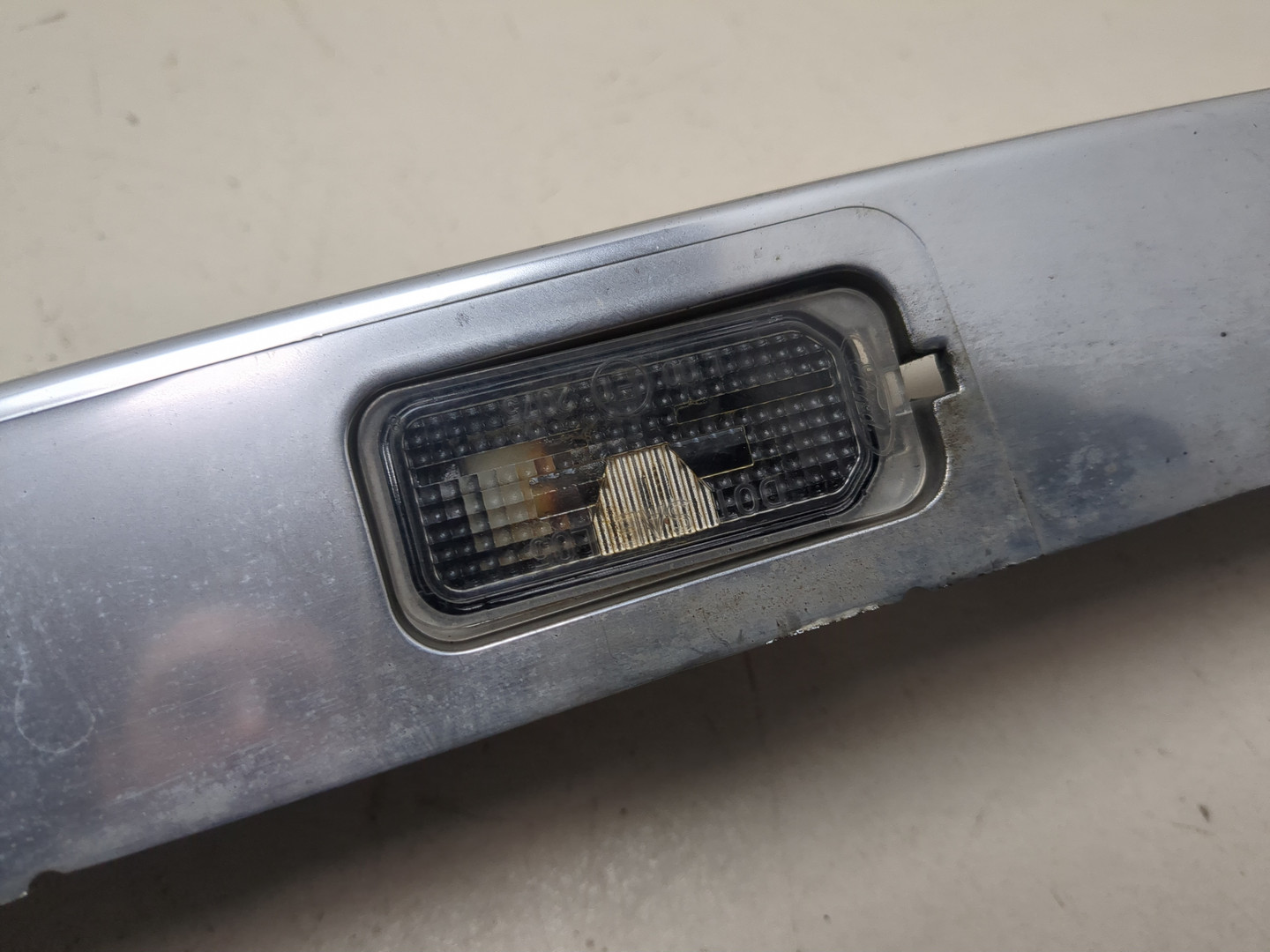 Фонарь подсветки номера