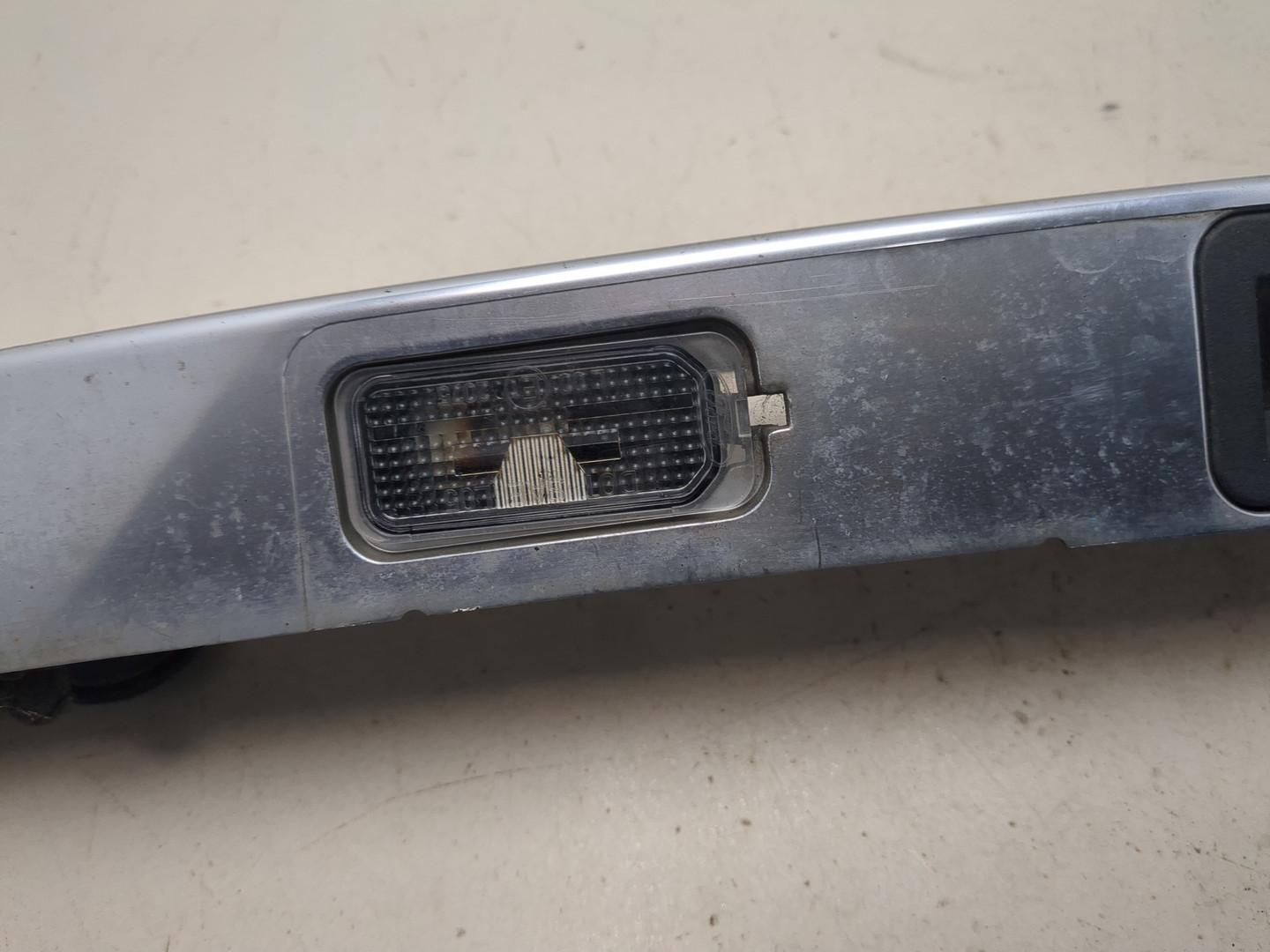 Фонарь подсветки номера