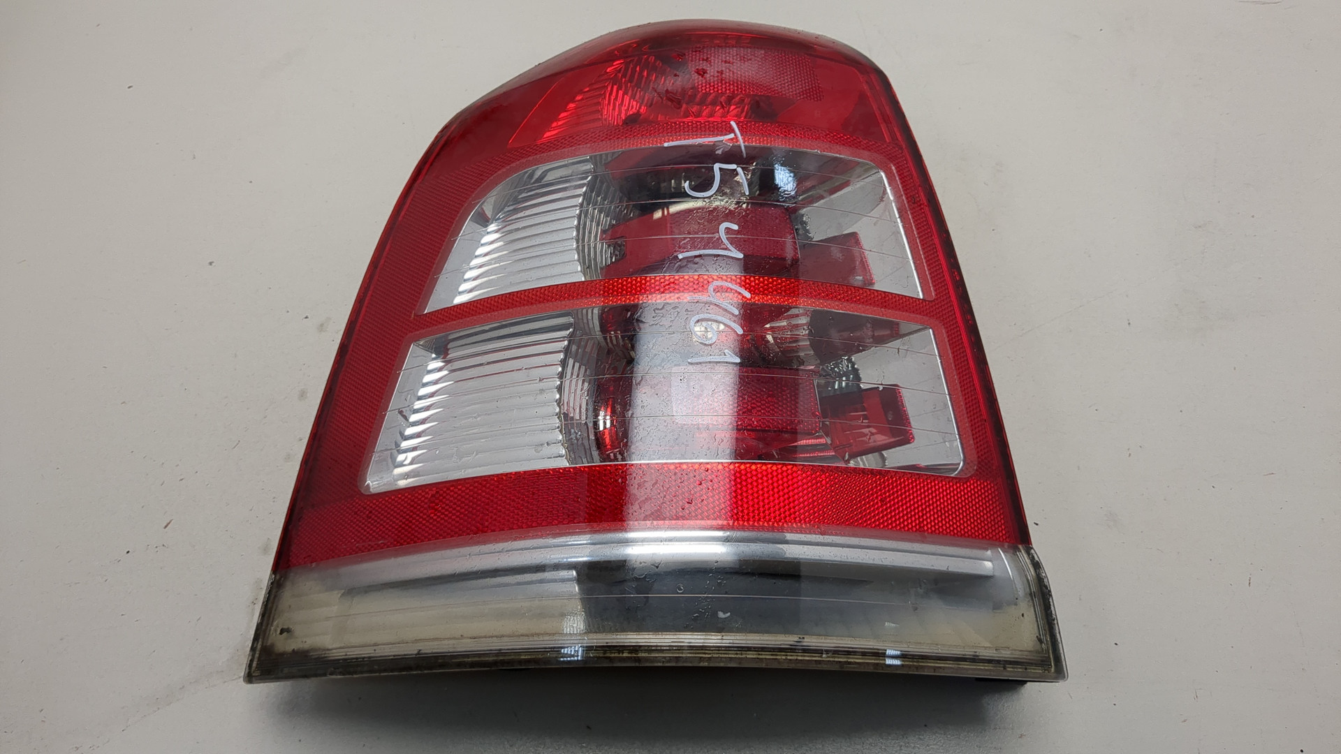 Фонарь задний левый