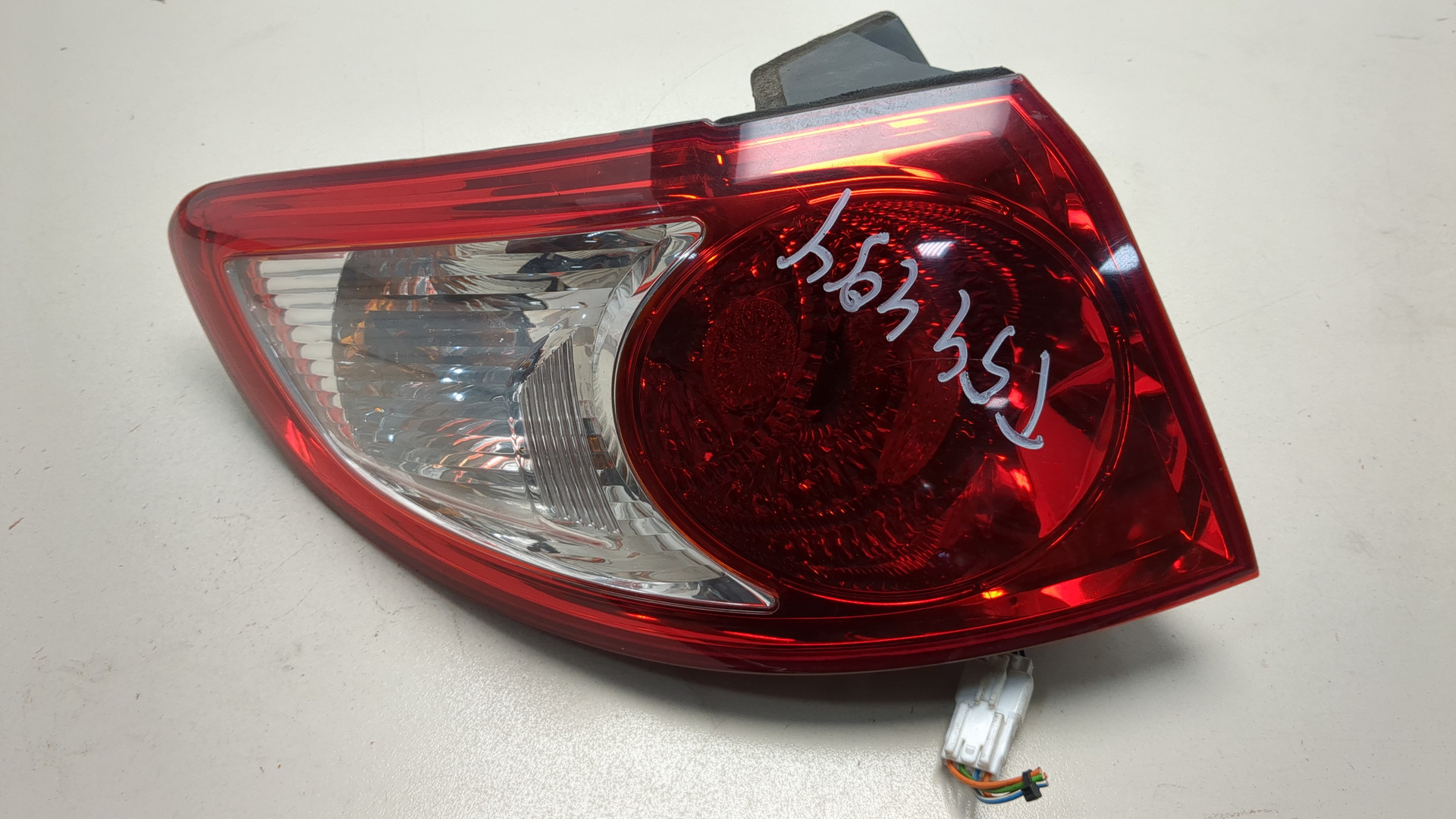 Фонарь задний левый