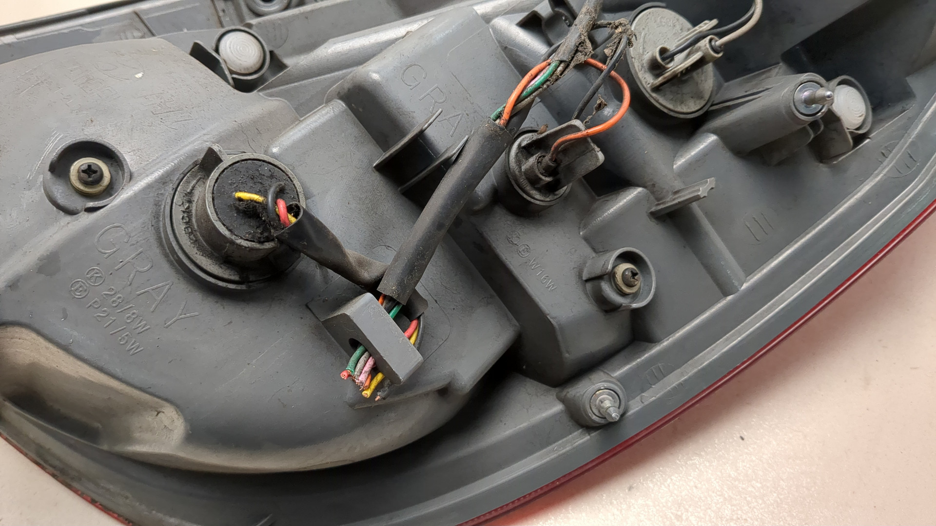 Фонарь задний левый