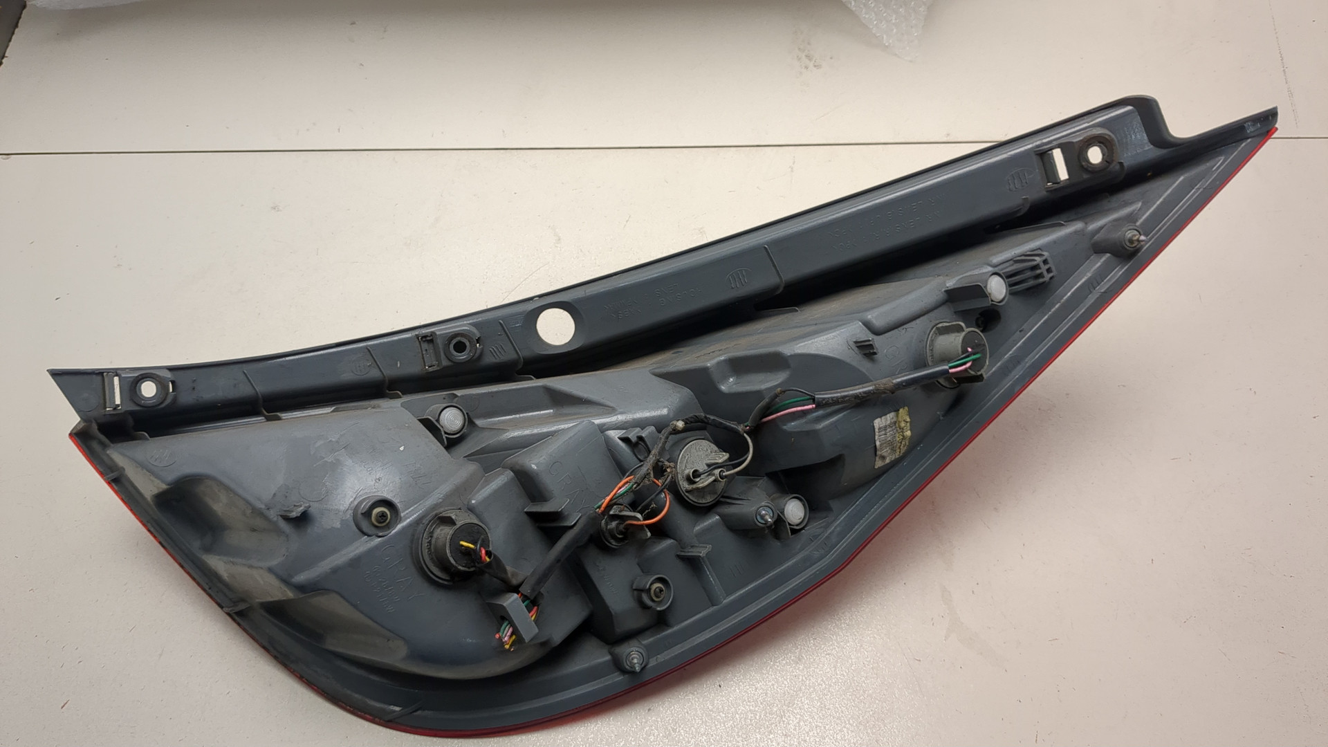 Фонарь задний левый