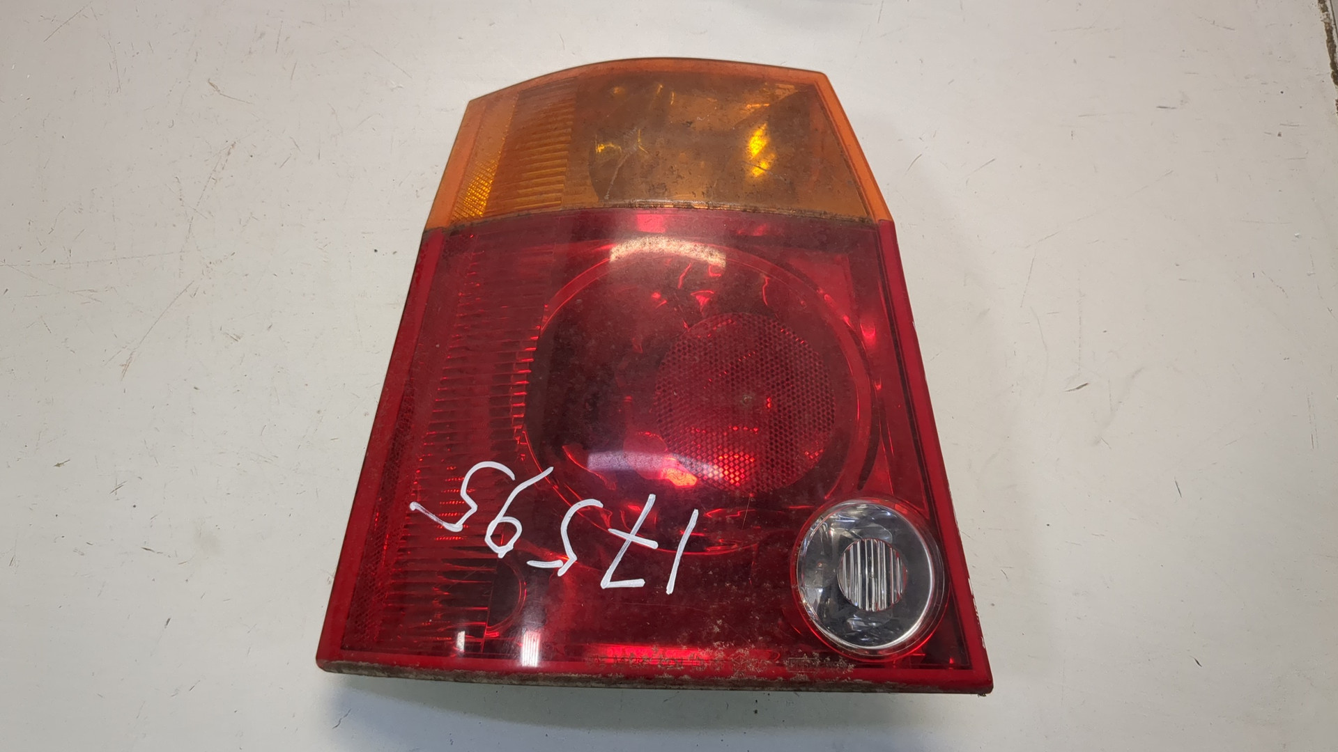 Фонарь задний левый