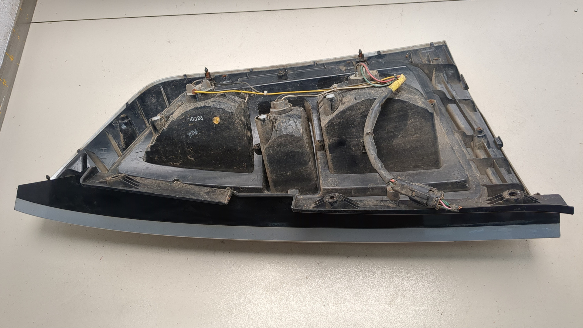 Фонарь задний левый