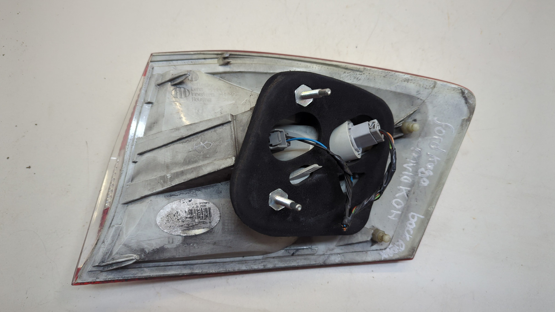 Фонарь задний левый