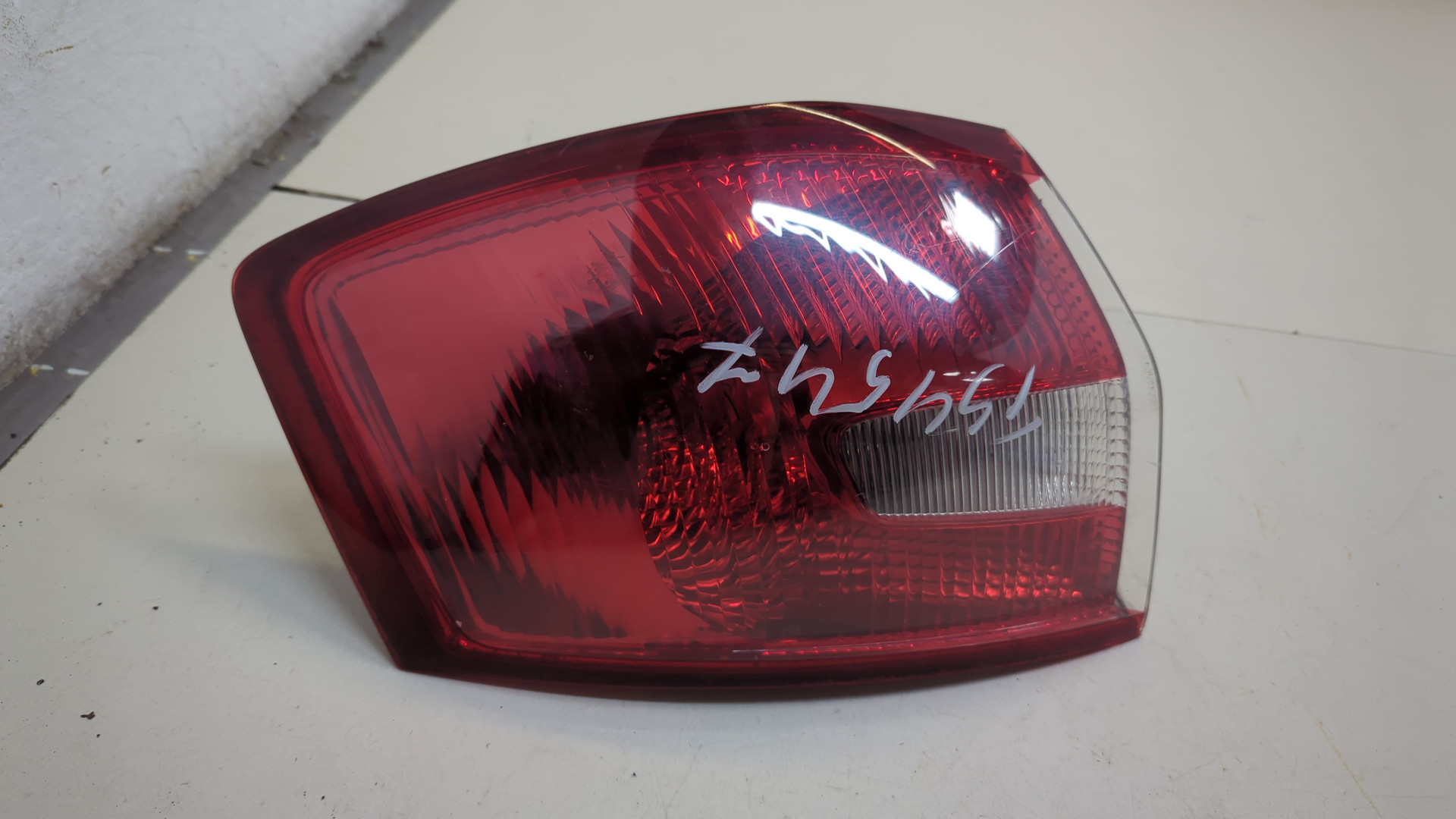 Фонарь задний левый