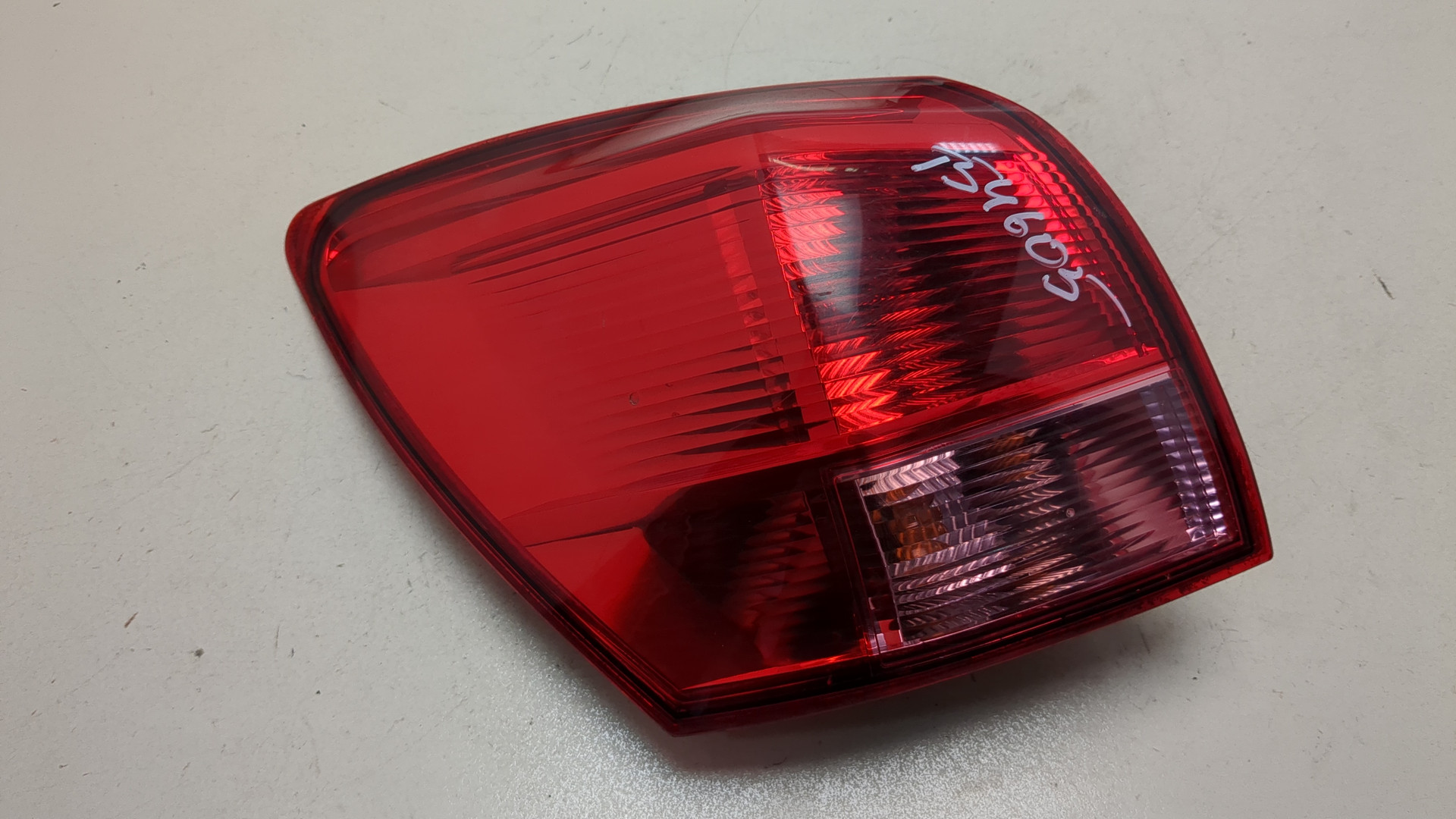 Фонарь задний левый