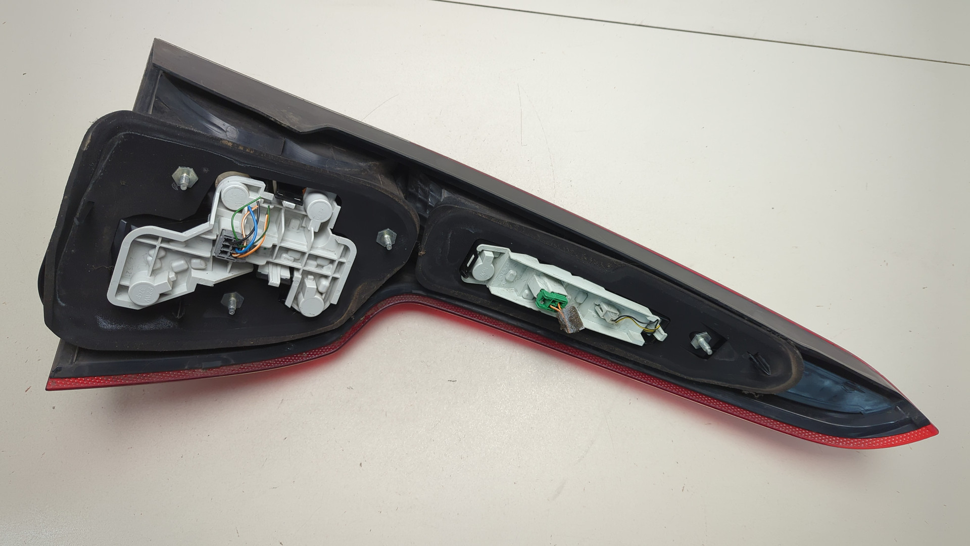 Фонарь задний левый