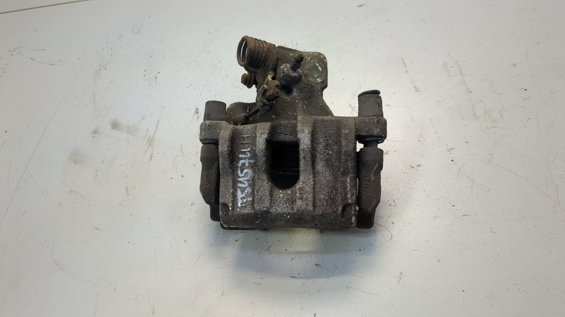 Суппорт задний левый