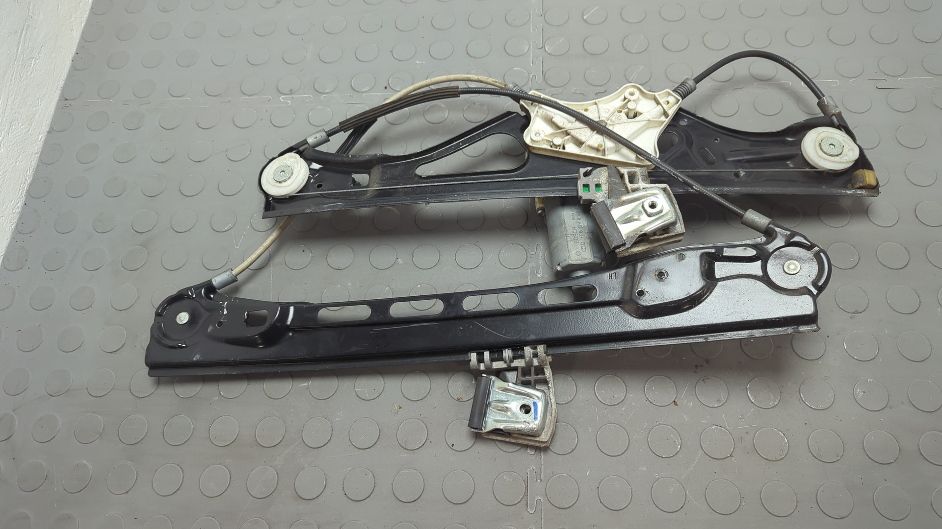 Стеклоподъемник электр. передний левый