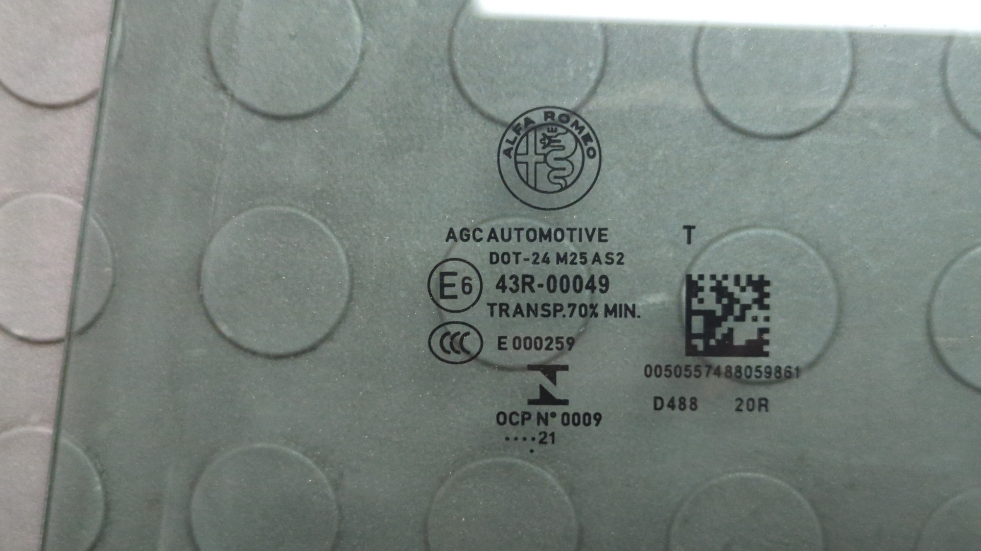 Стекло двери задней левой