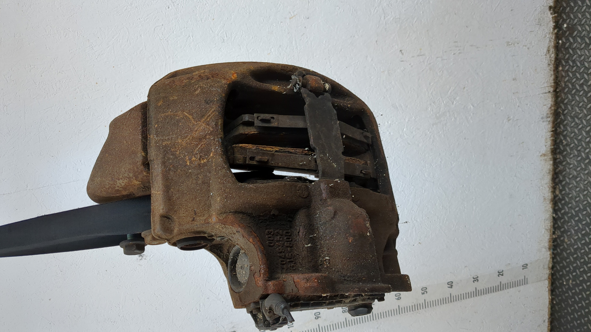 Суппорт задний левый