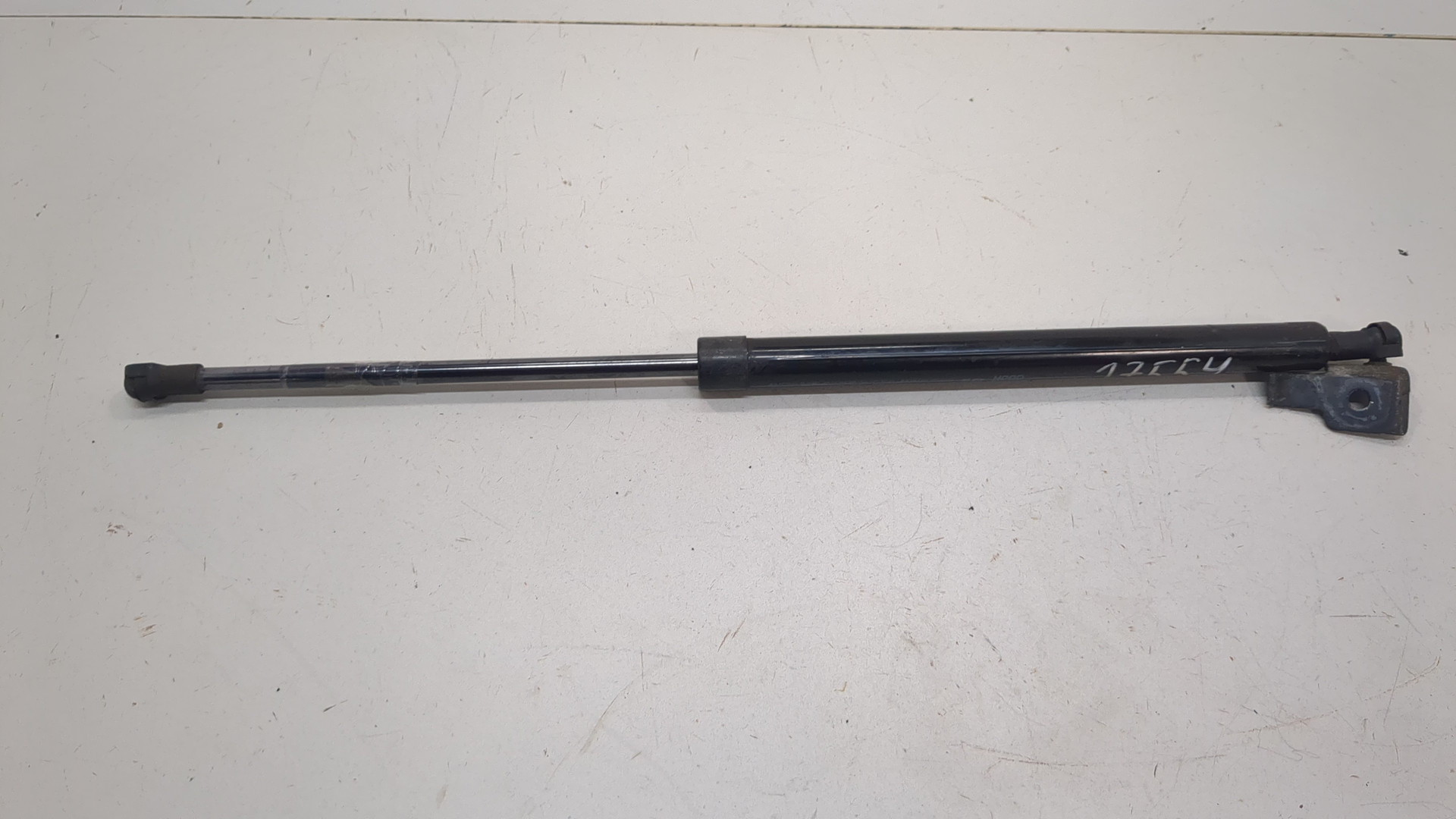 Амортизатор капота