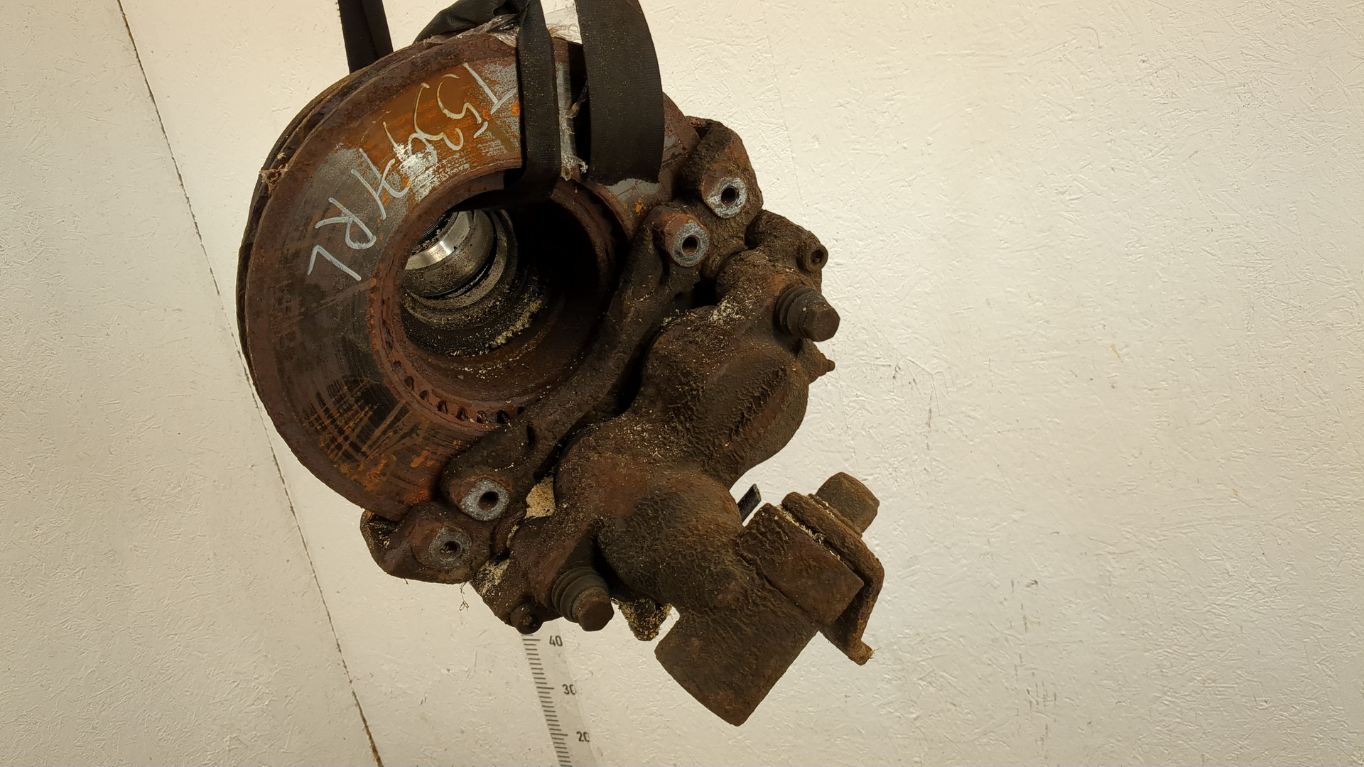 Кулак поворотный задний левый