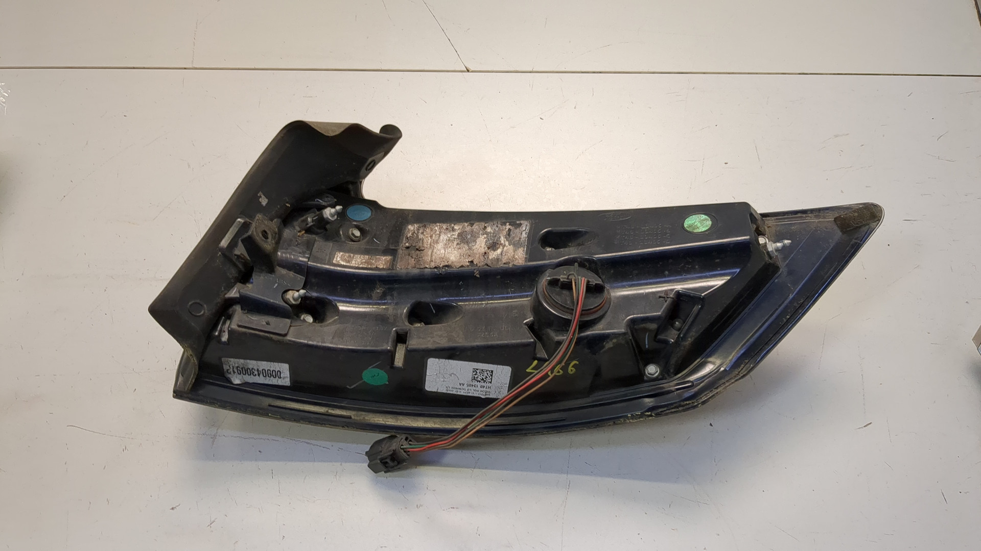 Фонарь задний левый