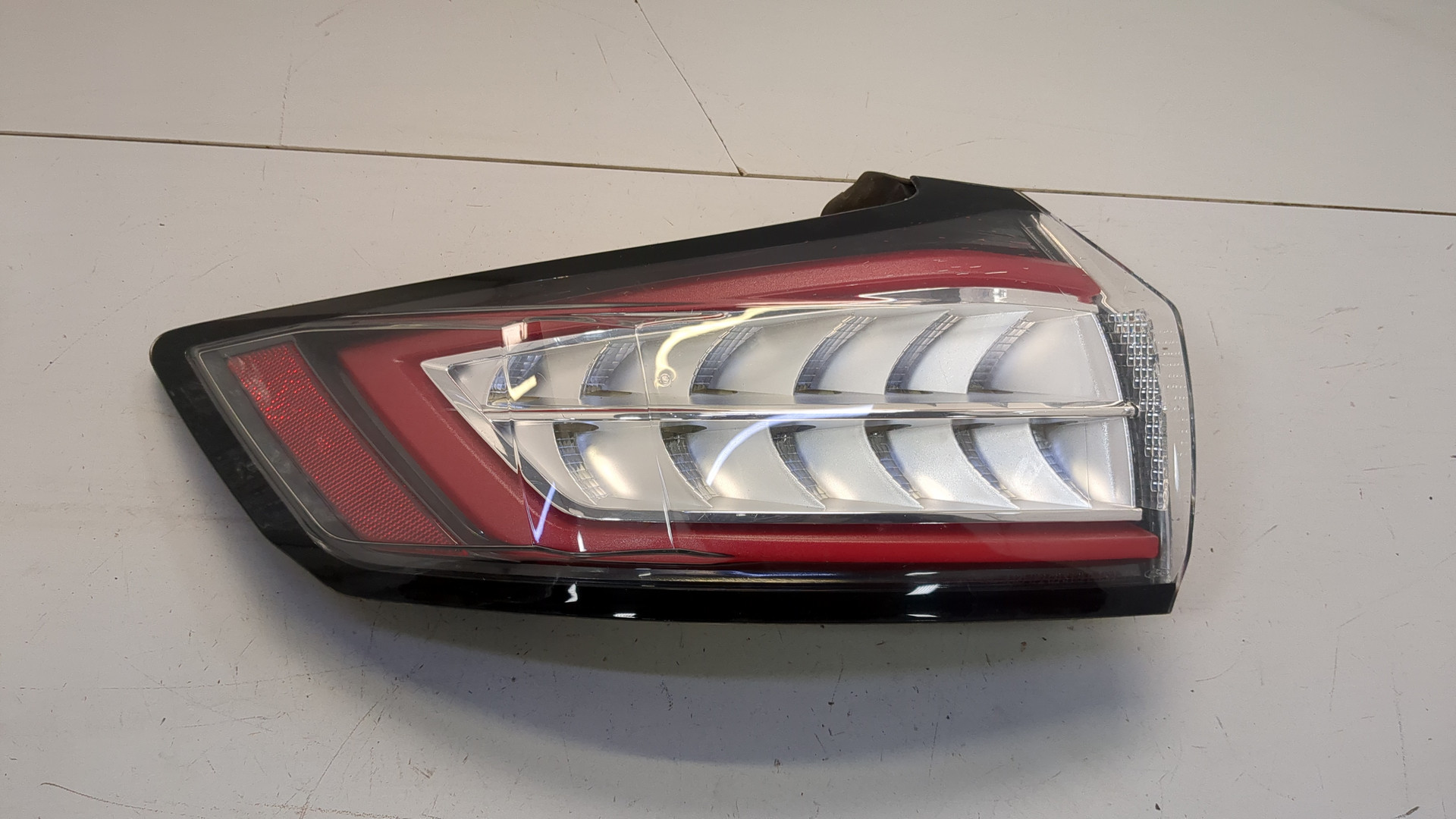 Фонарь задний левый