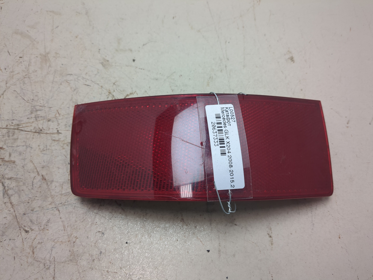 Отражатель в бампер задний левый