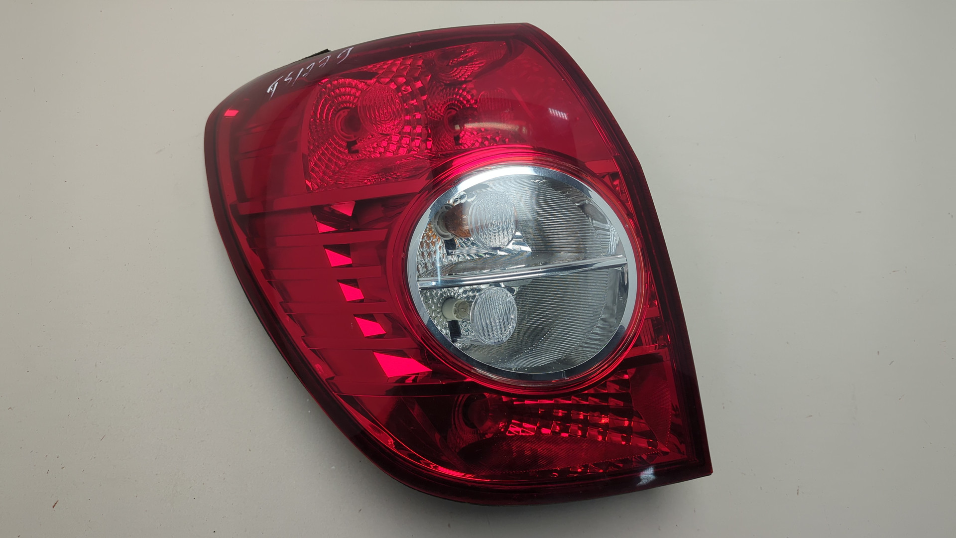 Фонарь задний левый