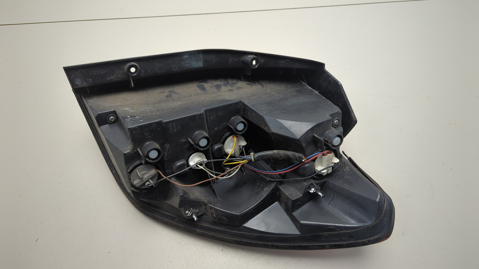 Фонарь задний левый