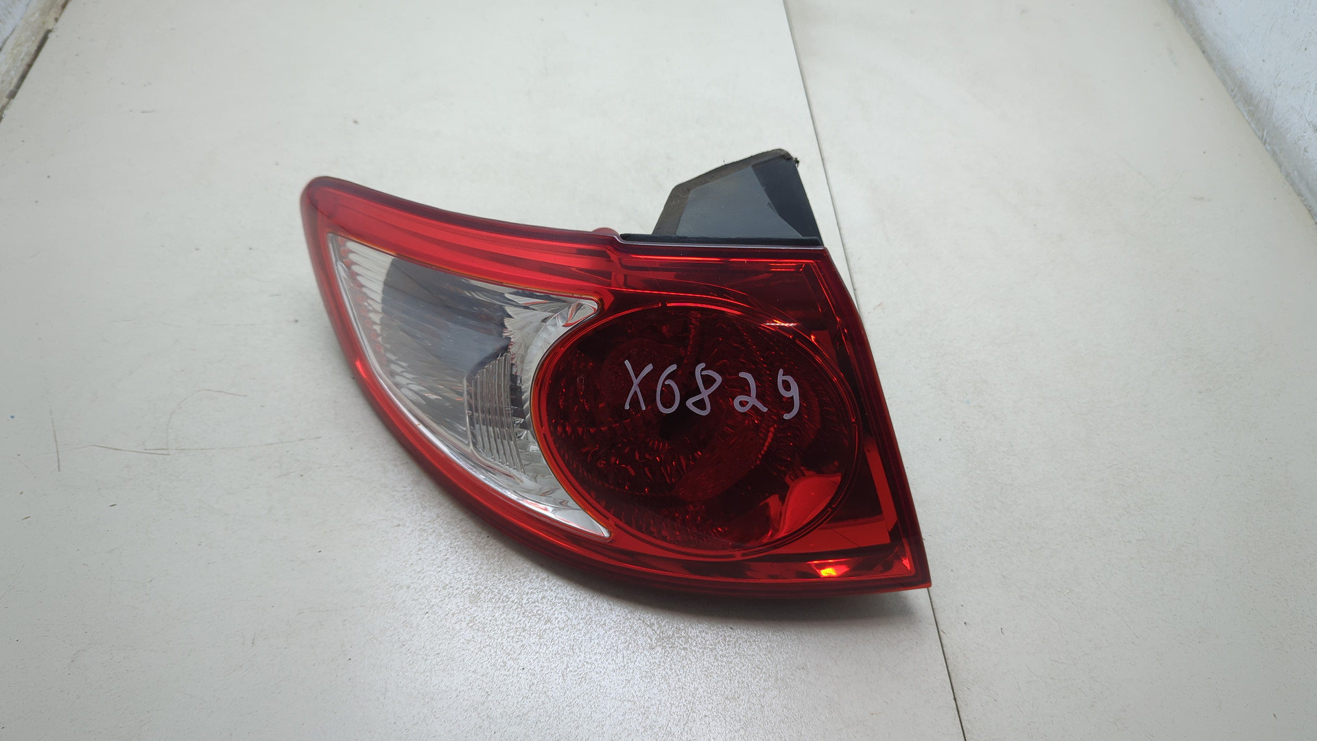 Фонарь задний левый