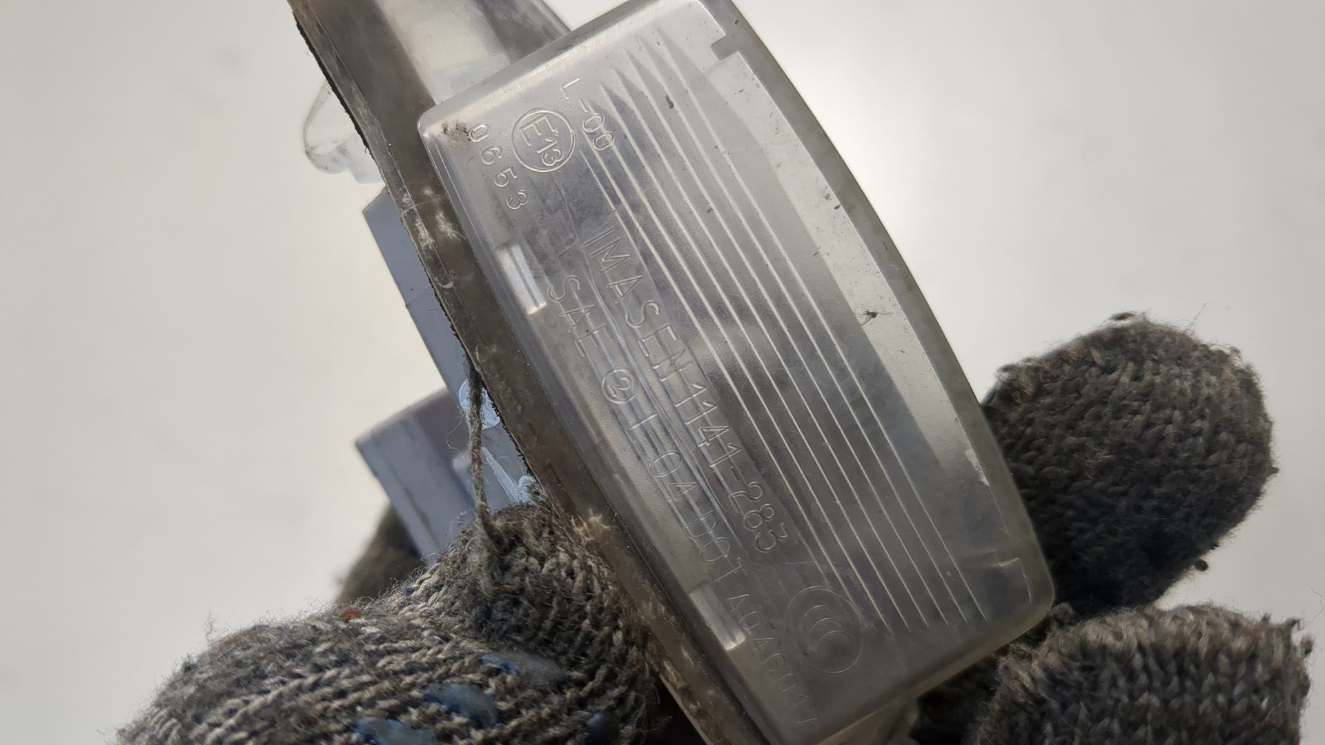 Фонарь подсветки номера