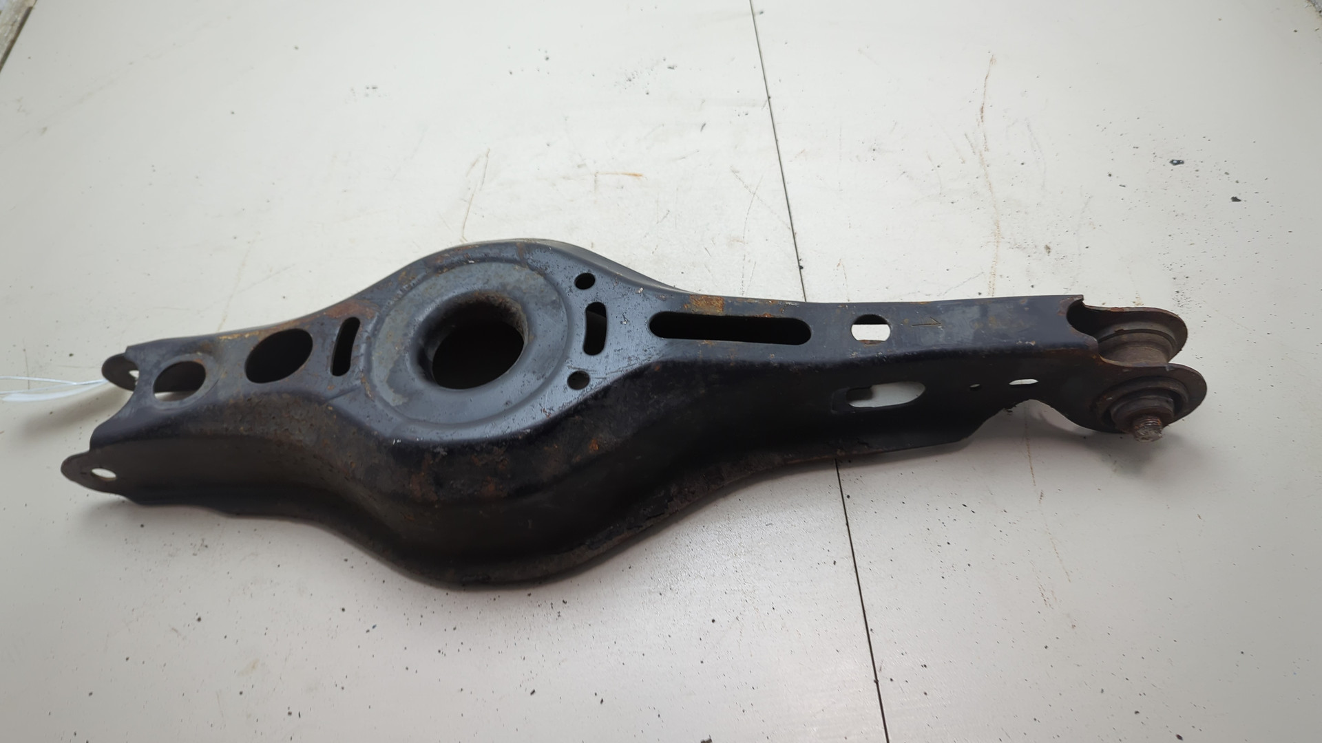 Рычаг задний левый