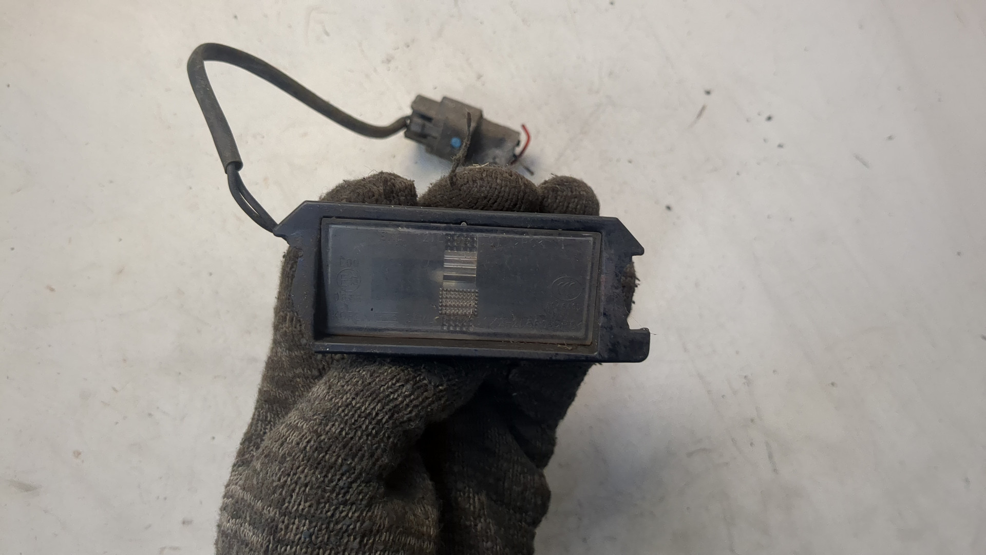 Фонарь подсветки номера