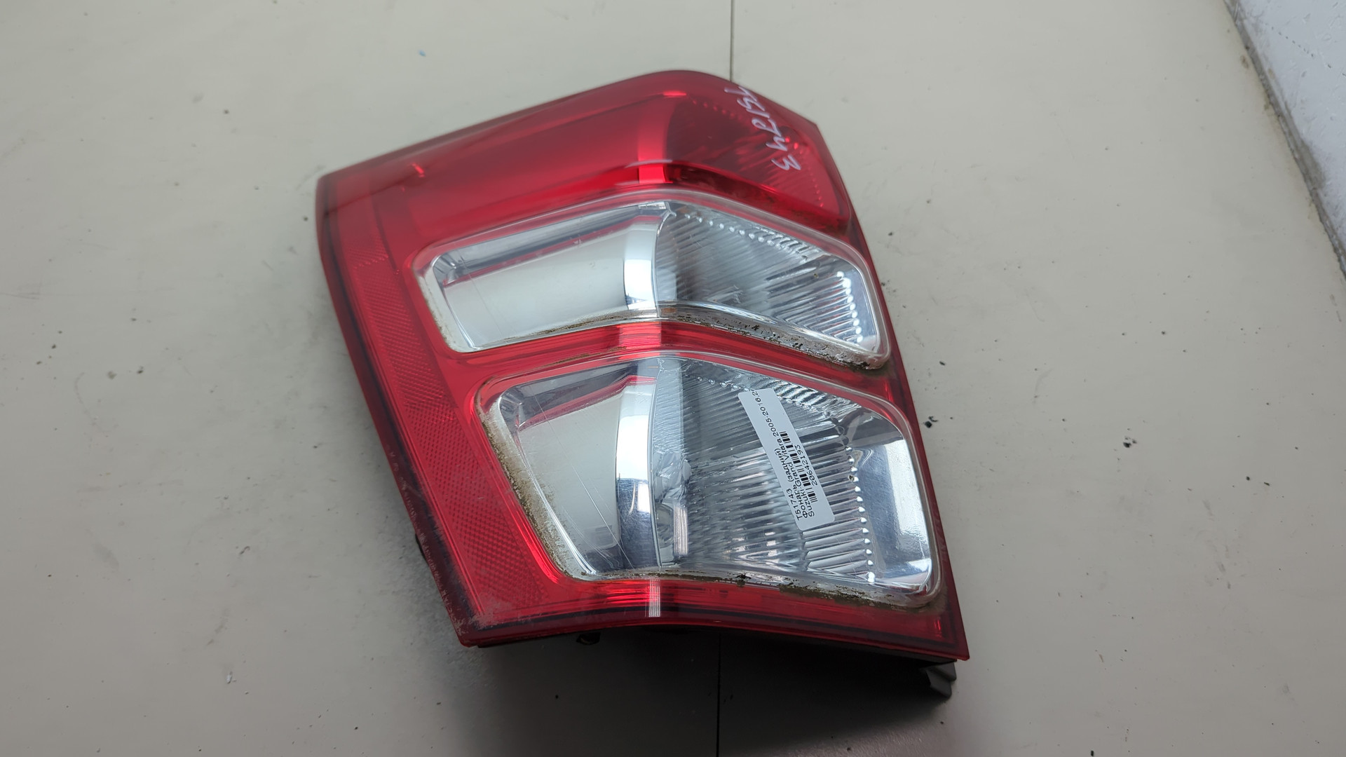 Фонарь задний левый